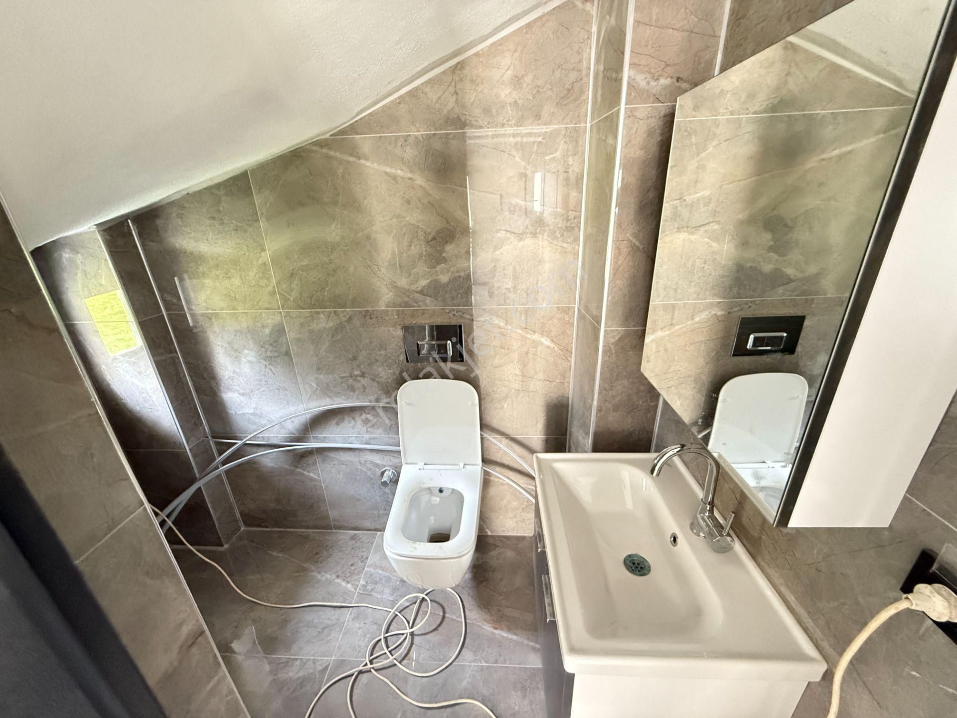 Seferihisar Doğanbey'de Satılık 3+1 Müstakil Sıfır Geniş Bahçeli Villa - Görsel 31