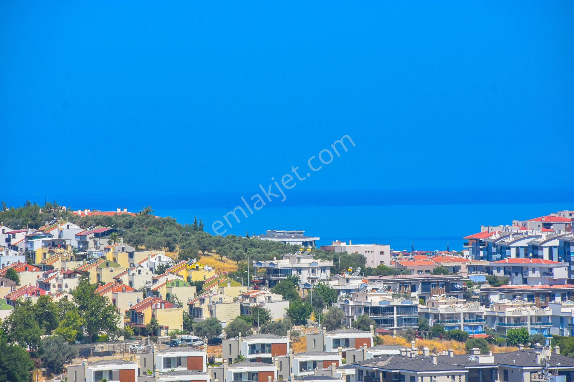 Kuşadası Değirmendere'de Bakımlı, Deniz Manzaralı Satılık Daire