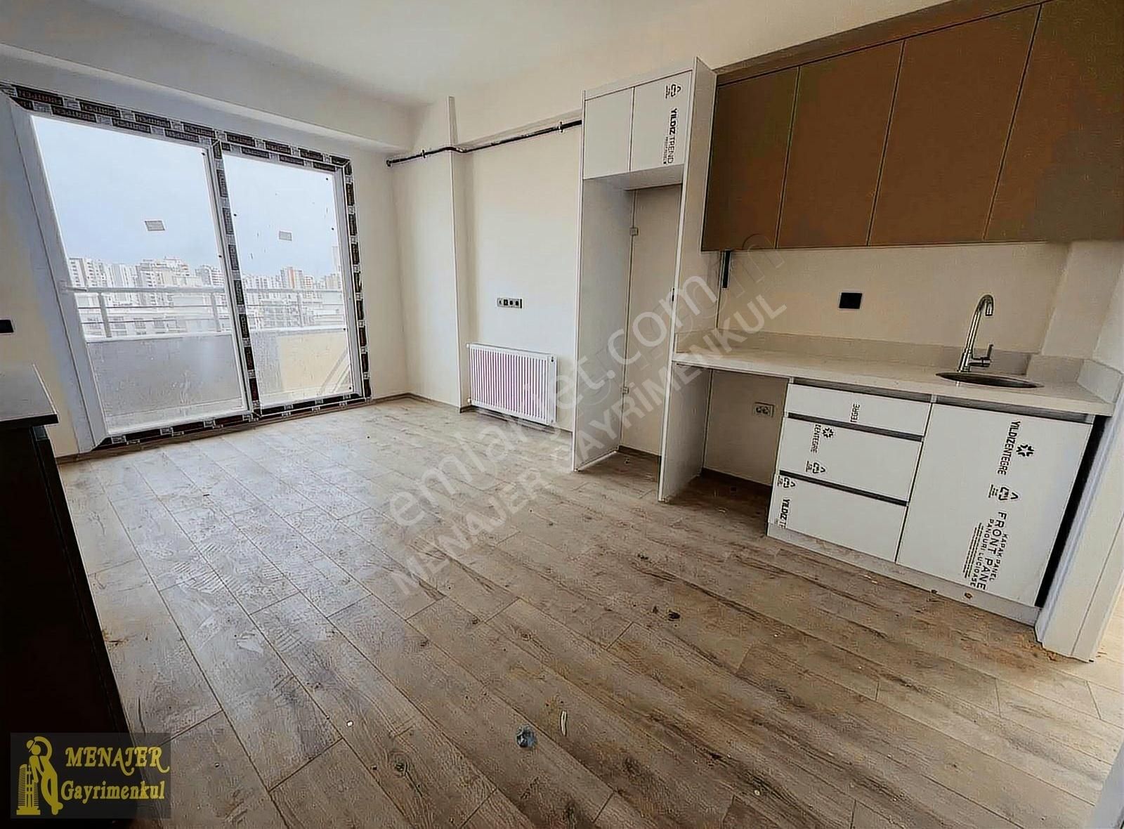 Menajerden Eski Mezitli Mh'de Site İçi 1+1 Satılık Yeni Yapı