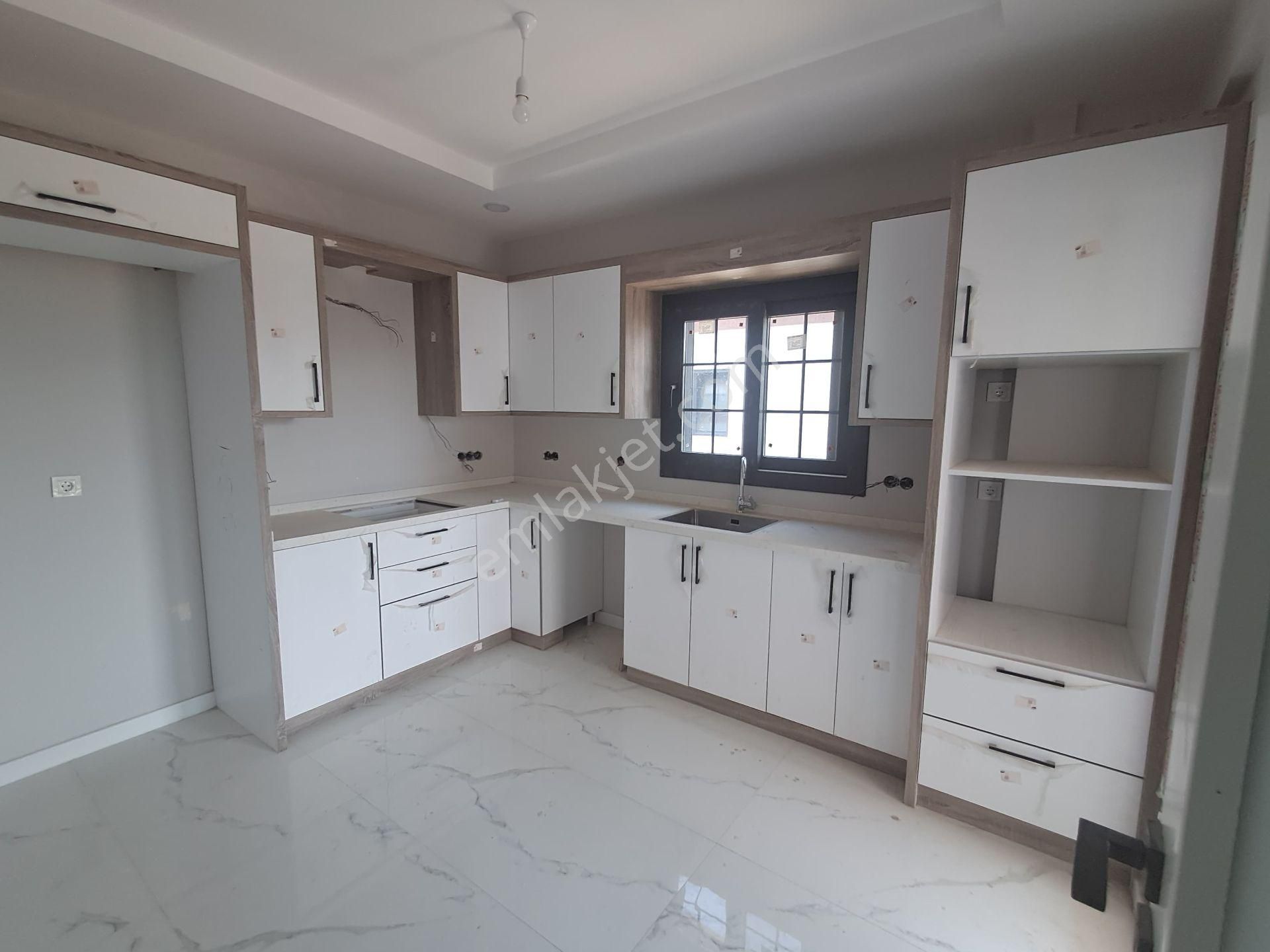 Dalaman Da Dost Emlaktan Merkezde Havuzlu Sıfır 2+1 Satılık Daire