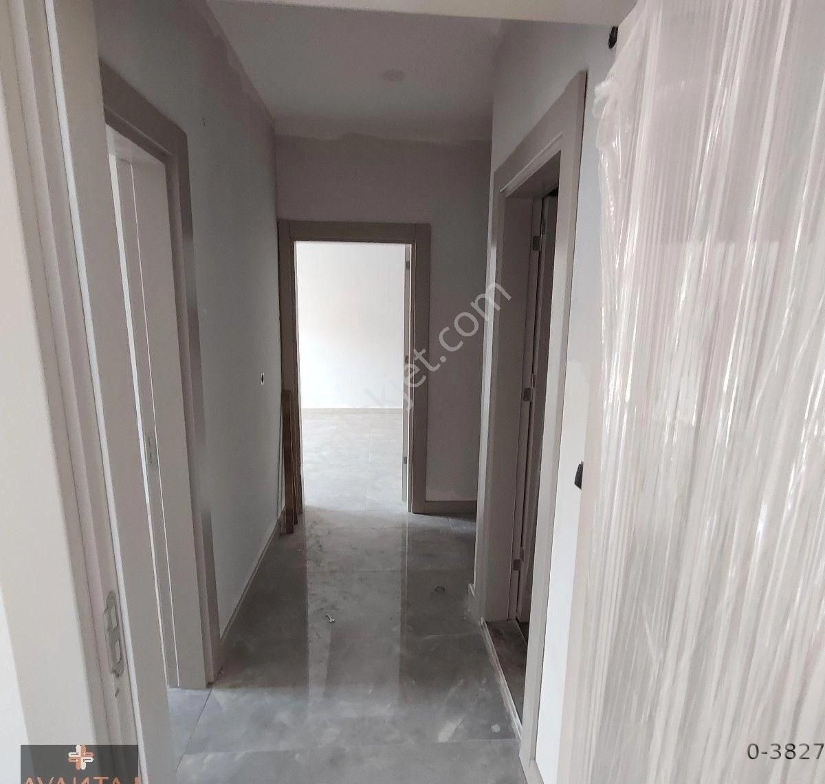 Kuşadası'nda Merkezi Konumda Havuzlu Sitede Sıfır 2+1 Daire - Görsel 14