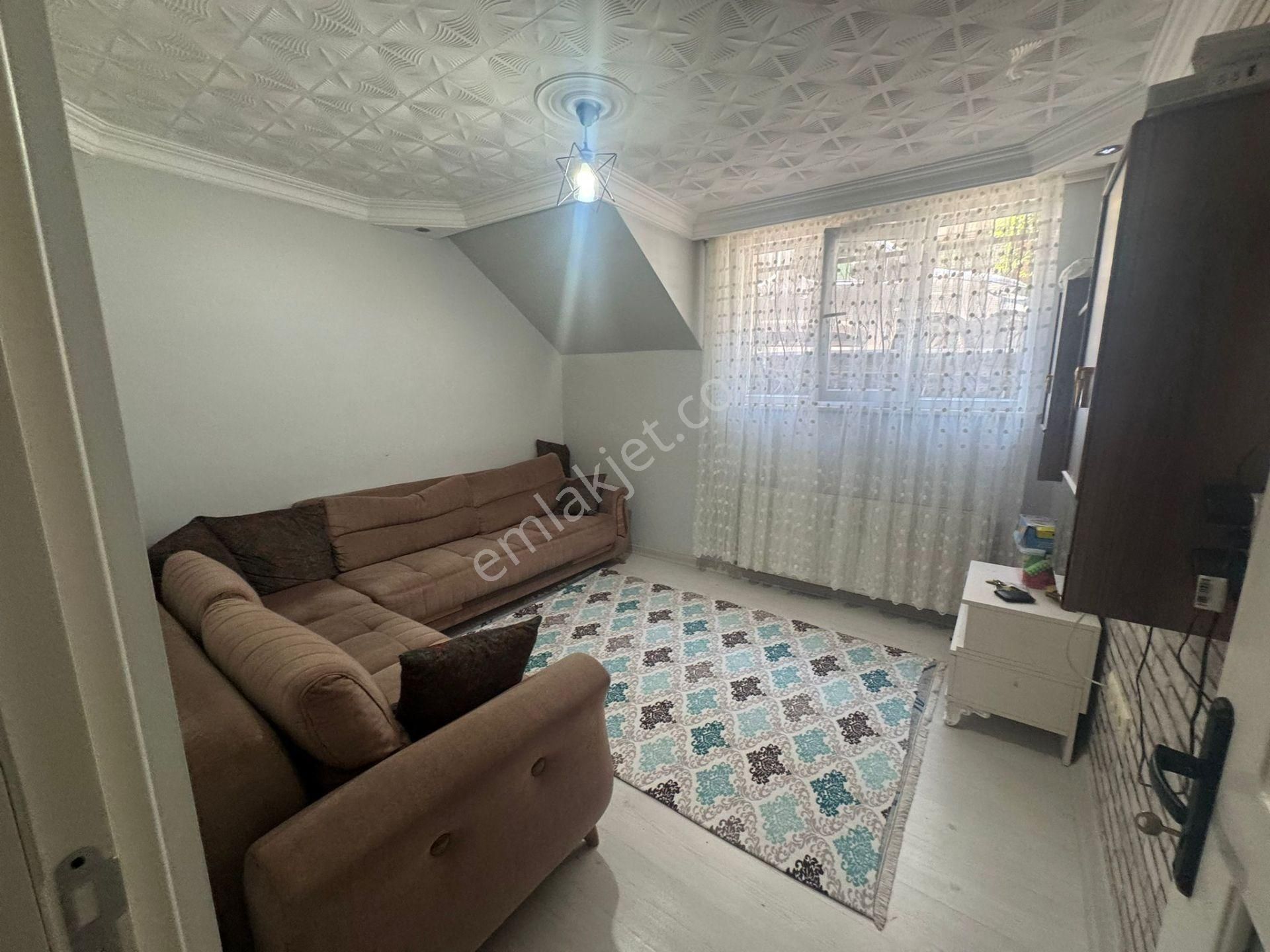 Home'dan Uğur Mumcu Mah'de Satılık 2+1 100m² Bahçe Katı Daire...