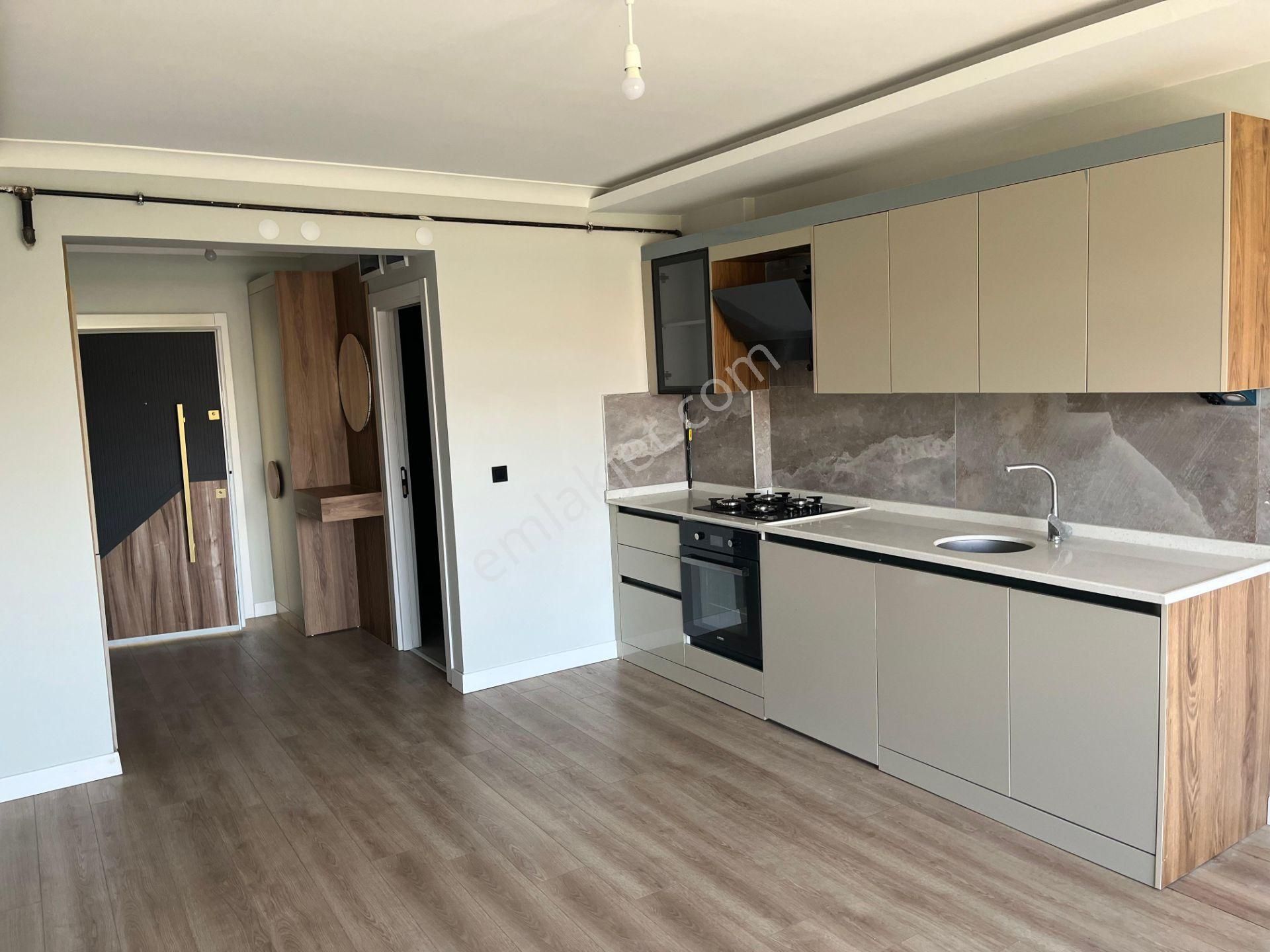 İncek'te Bulvara Yakın Kat Konumunda Yerden Isıtma Kiralık 1+1