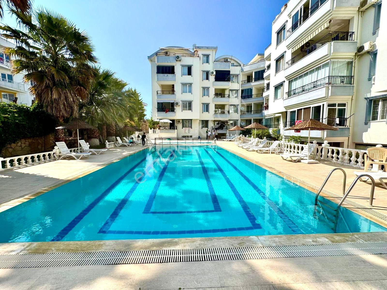 Didim'de Satılık Havuzlu Site İçerisinde 2+1 Asansörlü Geniş Daire