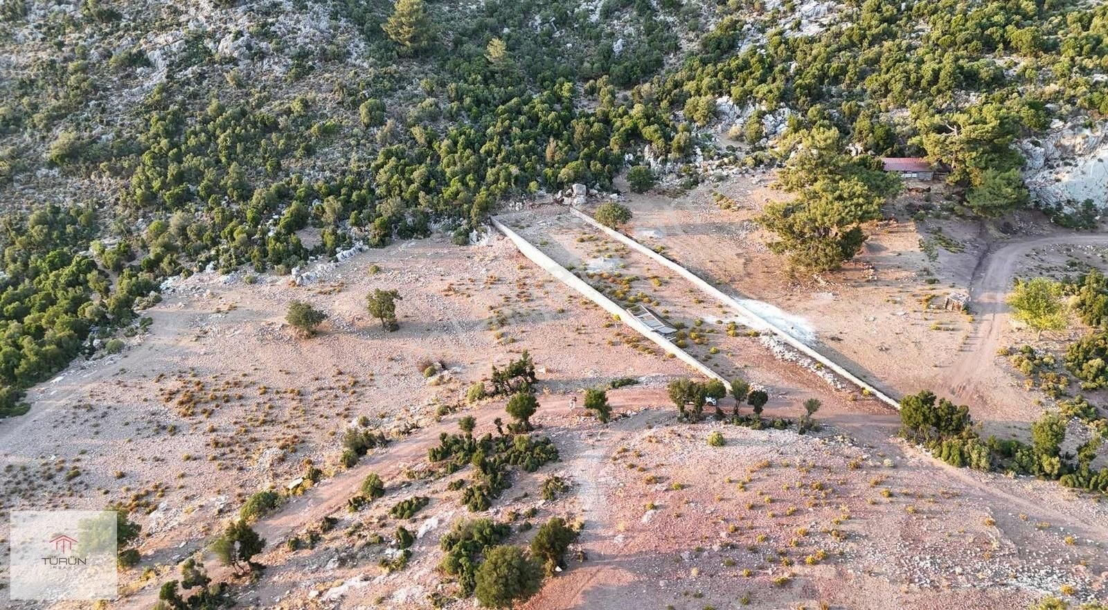 Fethiye Karağaçta 1083m2 Deniz Manzaralı Resmi Yollu Tarla - Görsel 9