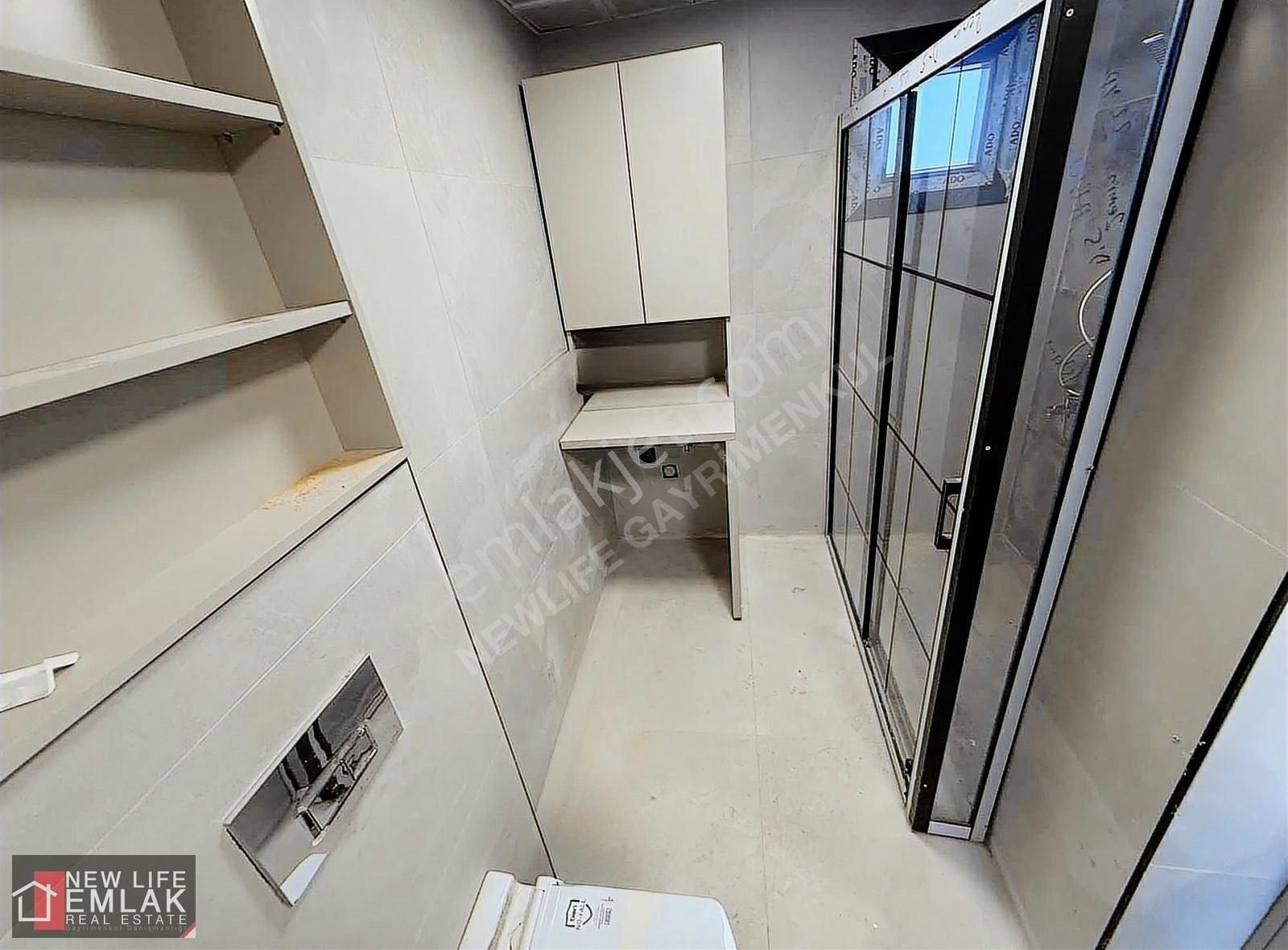 Kuşadası Merkezde Havuzlu Sitede Satılık Bahçe Katı Daire - Görsel 15