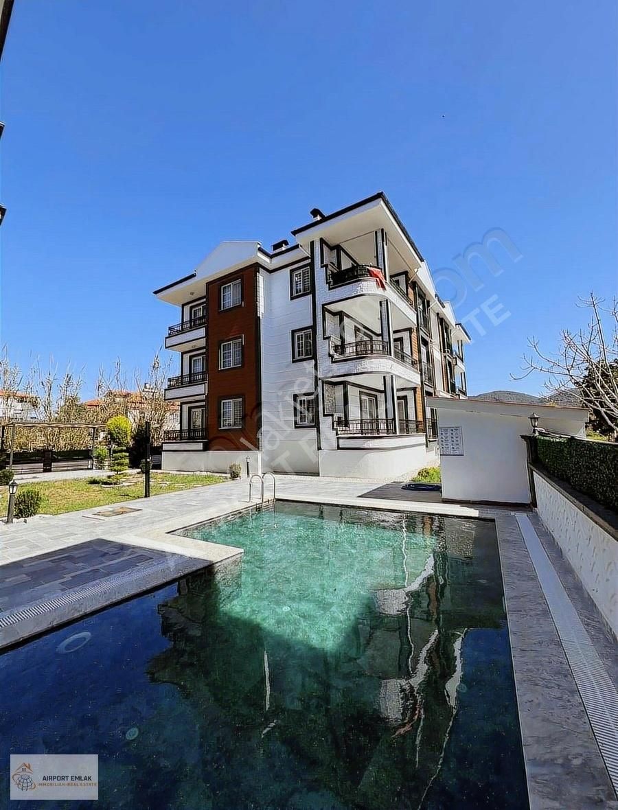 Airport Emlaktan Asmin Sitesinde Boş Kiralık Havuzlu 1+1