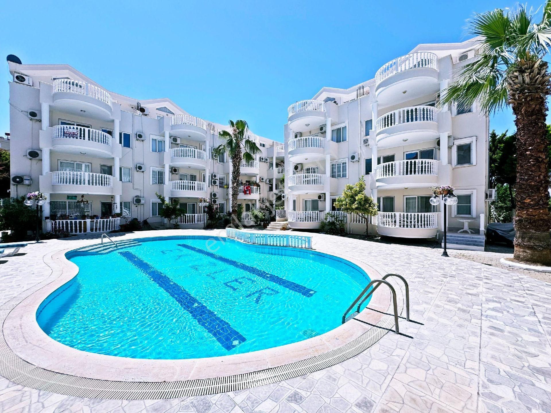 Didim Satılık Havuzlu Sitede 3+1 Merkezi Konumda Güvenlikli Yazlık Dublex Daire