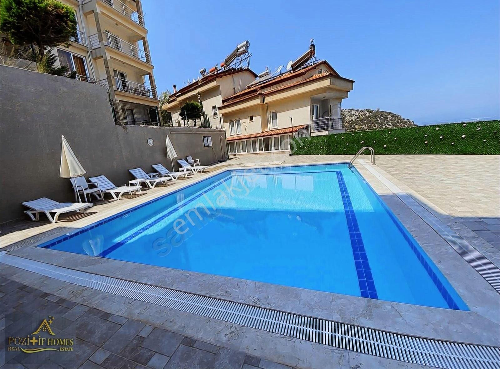 Taşyaka'da 2+1 Deniz Manzaralı Havuzlu Eşyalı Satılık Daire