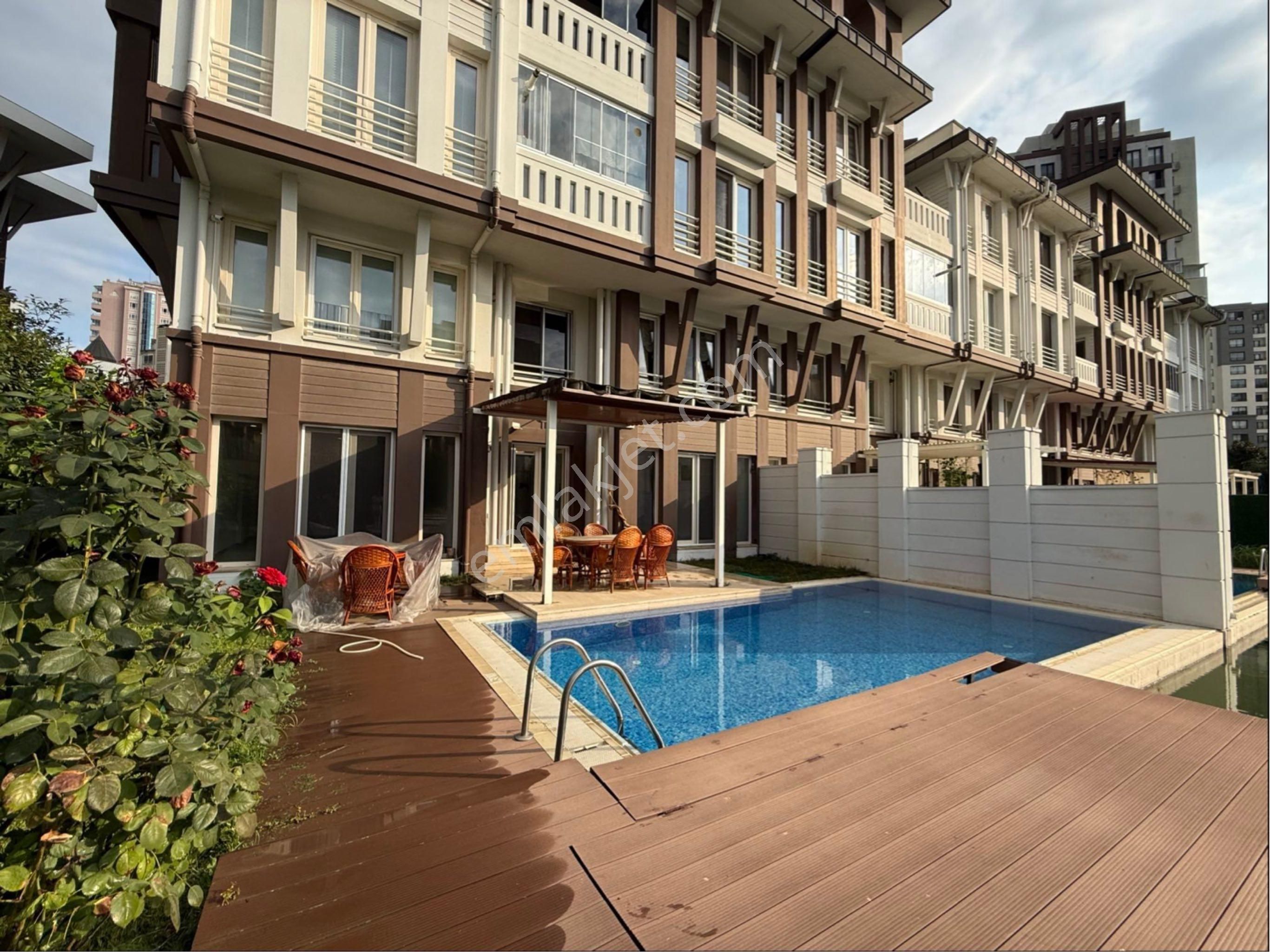Kaçmaz Emlak Kiralık Bursa Modern Sitesi Havuzlu Bahçeli Yalı Dairesi