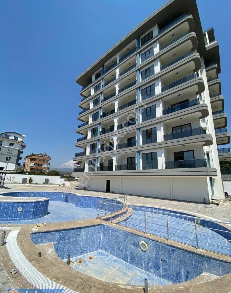 Emlaknomi Satılık 1+1 Sıfır 50 Metrekare Balkon Var 3.kat Havuz Oto Park Deniz 900 Metre Mesafe