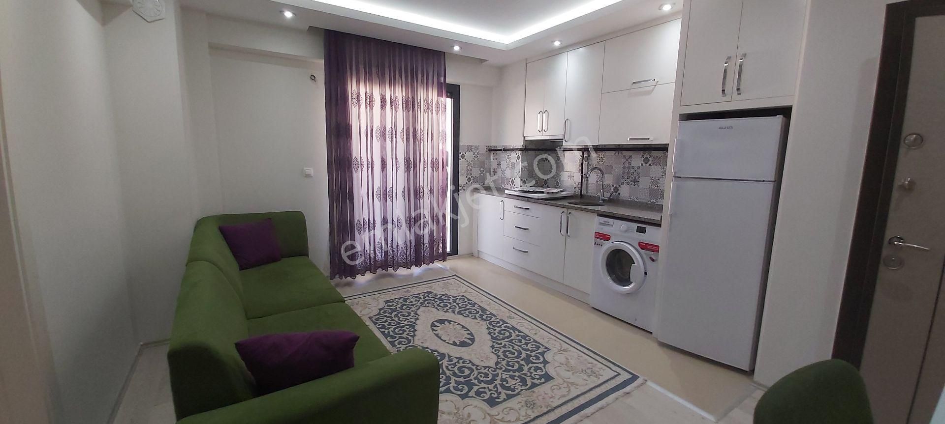 Ender Uysal Gayrimenkulden Asmalıevlerde 1+1 Ara Kat Asansörlü Balkonlu Apart....