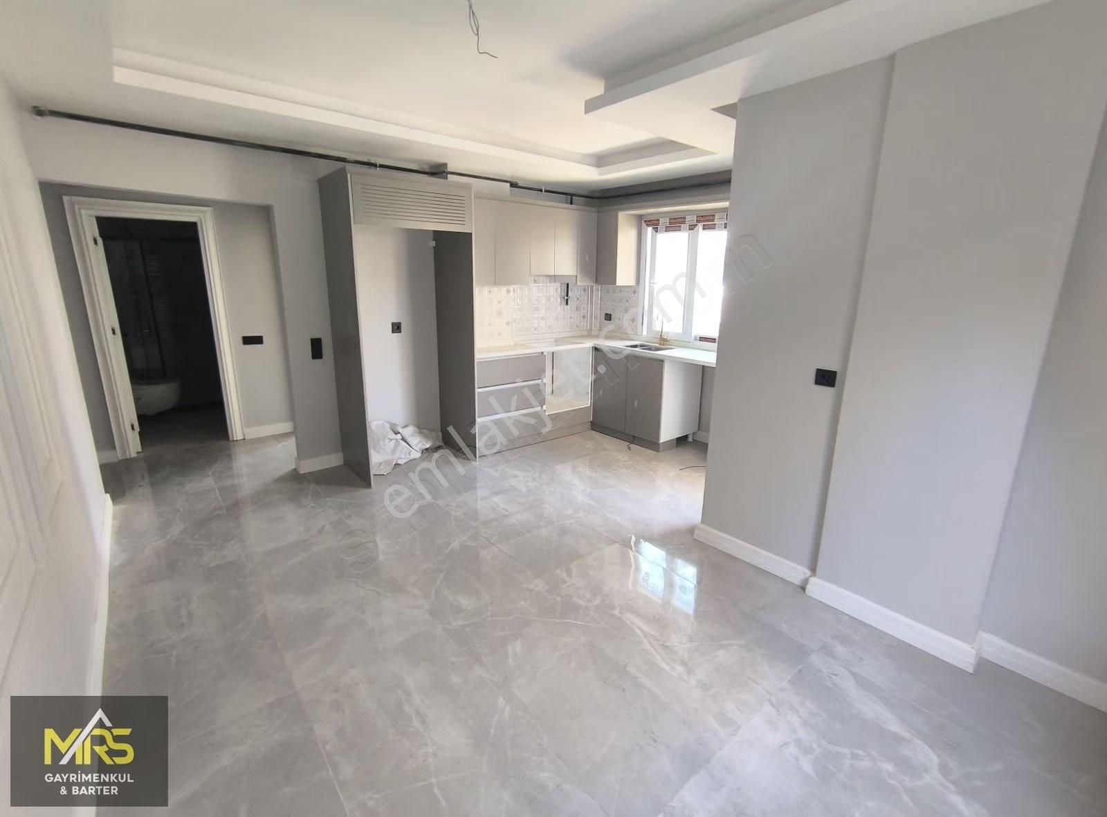 Mrs Gayrimenkulden Yenişehirde İskanlı Satılık 2+1 Daire