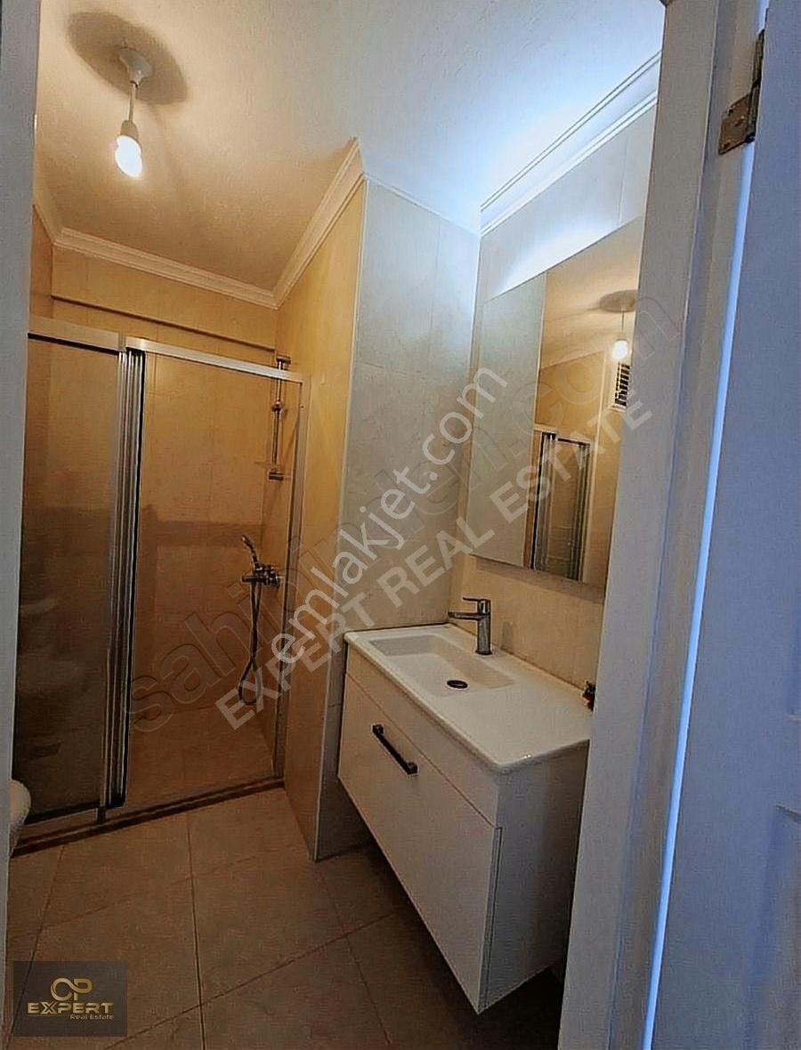 Kuşadası Merkezde Havuzlu Sitede Satılık Arakat Daire - Görsel 15