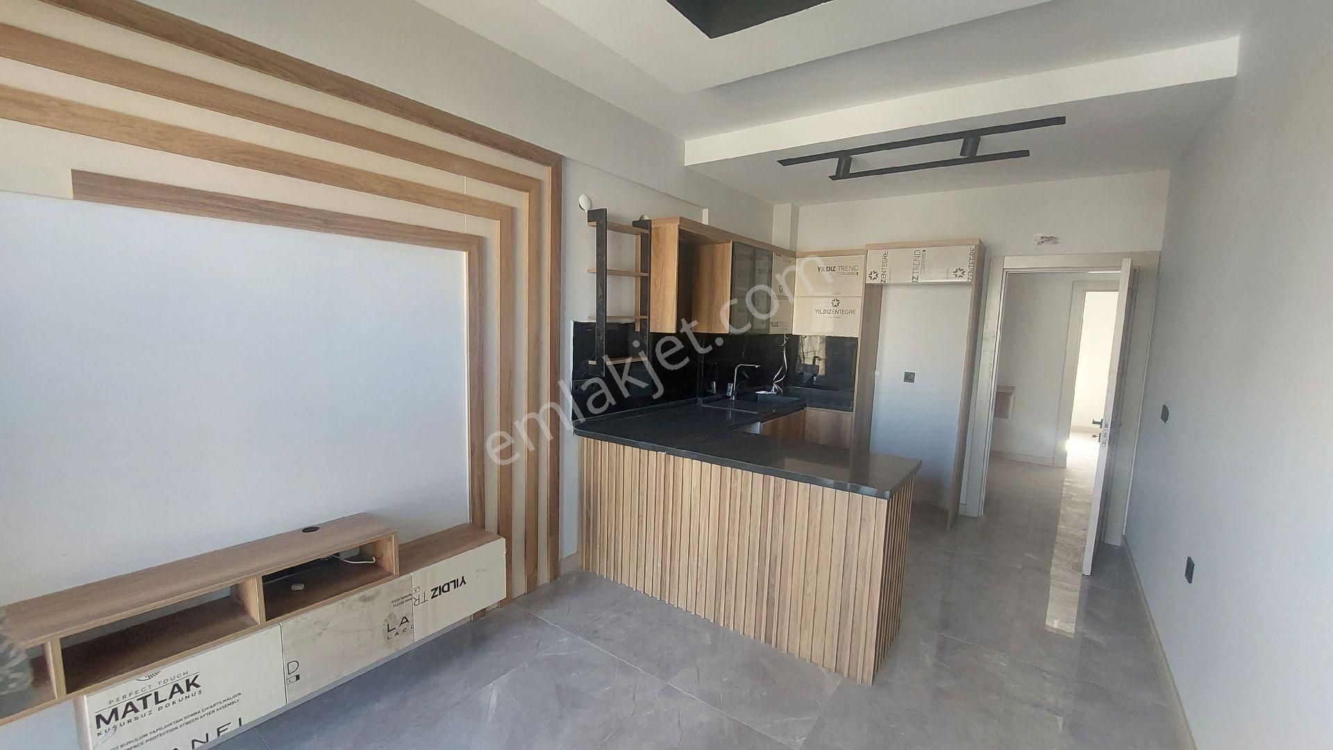 Kuşadası Ege Mahallesinde Havuzlu Sitede Yerden Isıtmalı Satılık 1+1 - Görsel 3