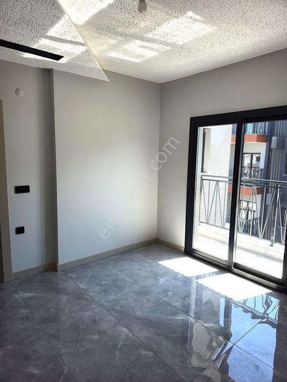 Kuşadası Ege Mahallesinde Havuzlu Sitede Deniz Ve Havuz Manzaralı Yerden Isıtmalı 3+1 Sıfır Daire - Görsel 14