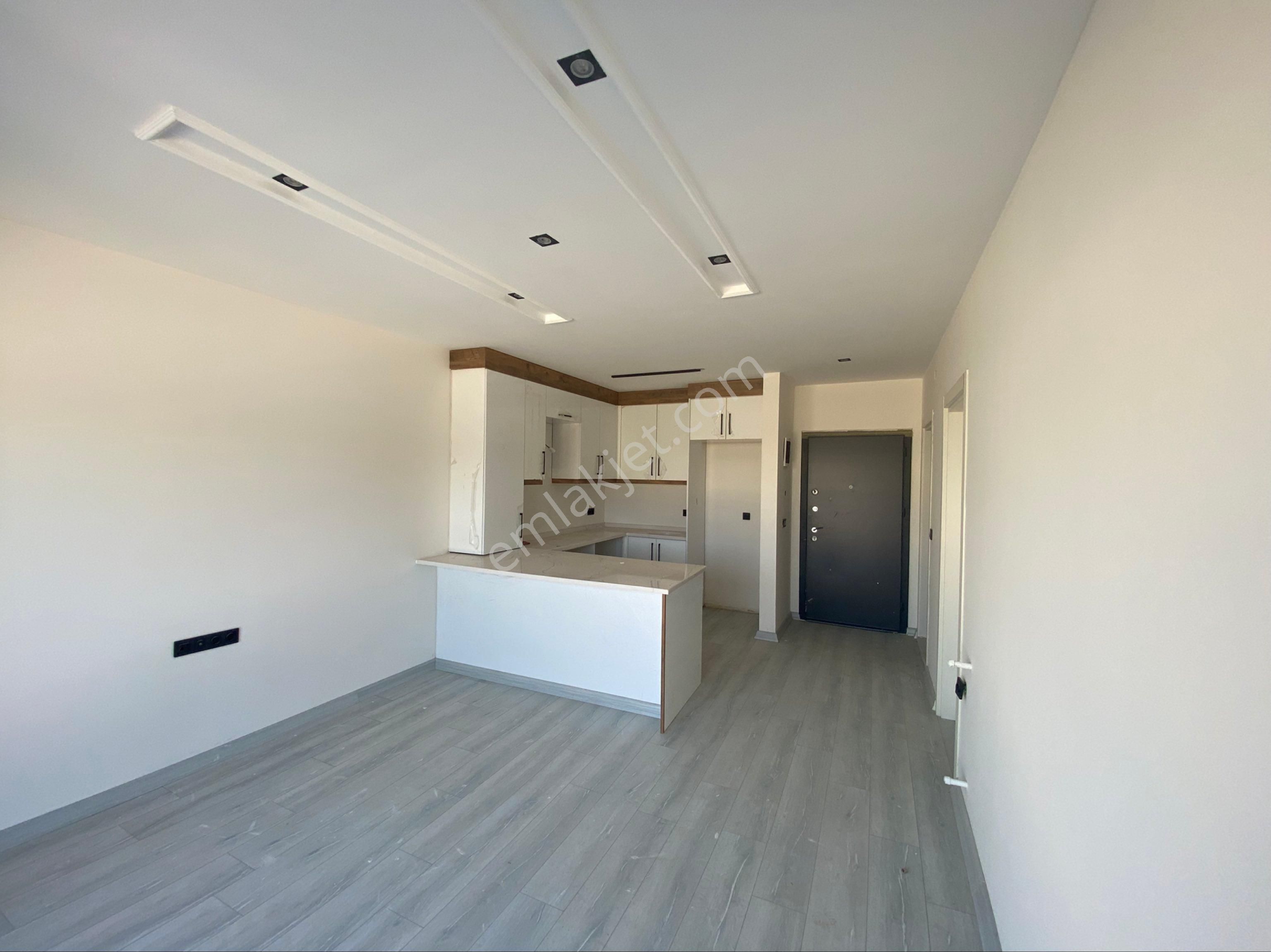 Kuşadası’da Merkezi Konumda Sıfır Satılık Rezidans Daire - Görsel 21