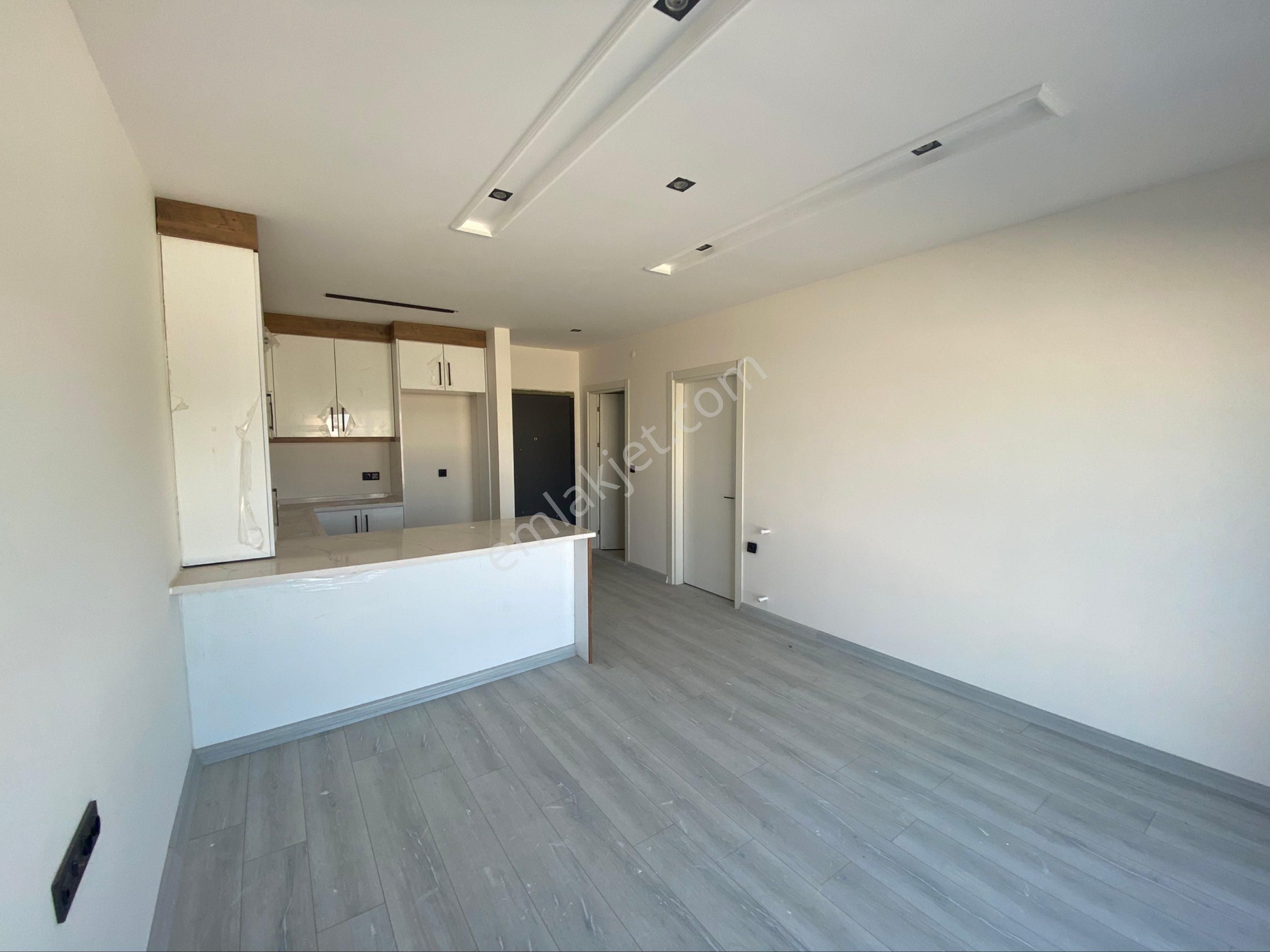 Kuşadası’da Merkezi Konumda Sıfır Satılık Rezidans Daire - Görsel 2