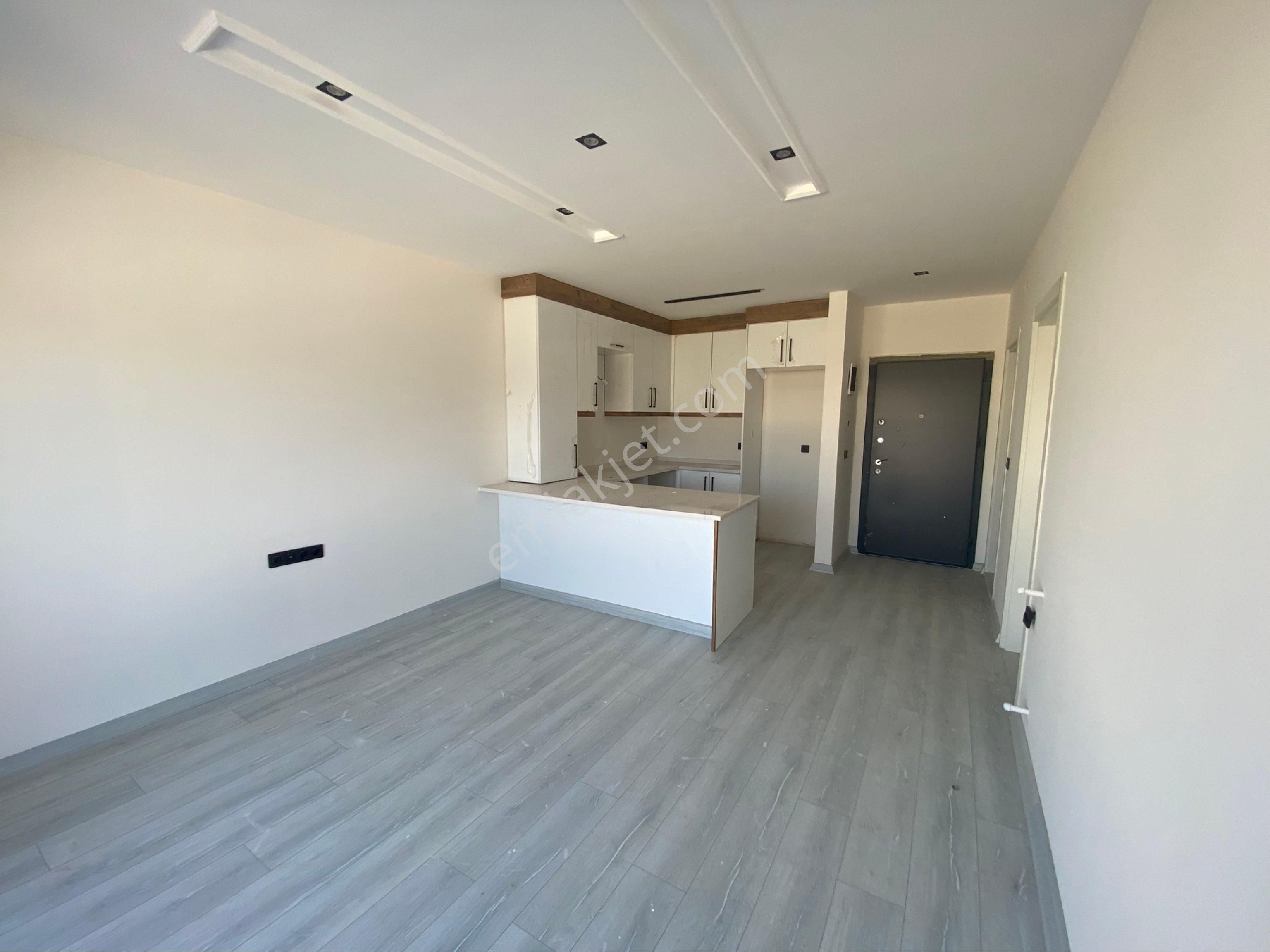 Kuşadası’da Merkezi Konumda Sıfır Satılık Rezidans Daire - Görsel 3