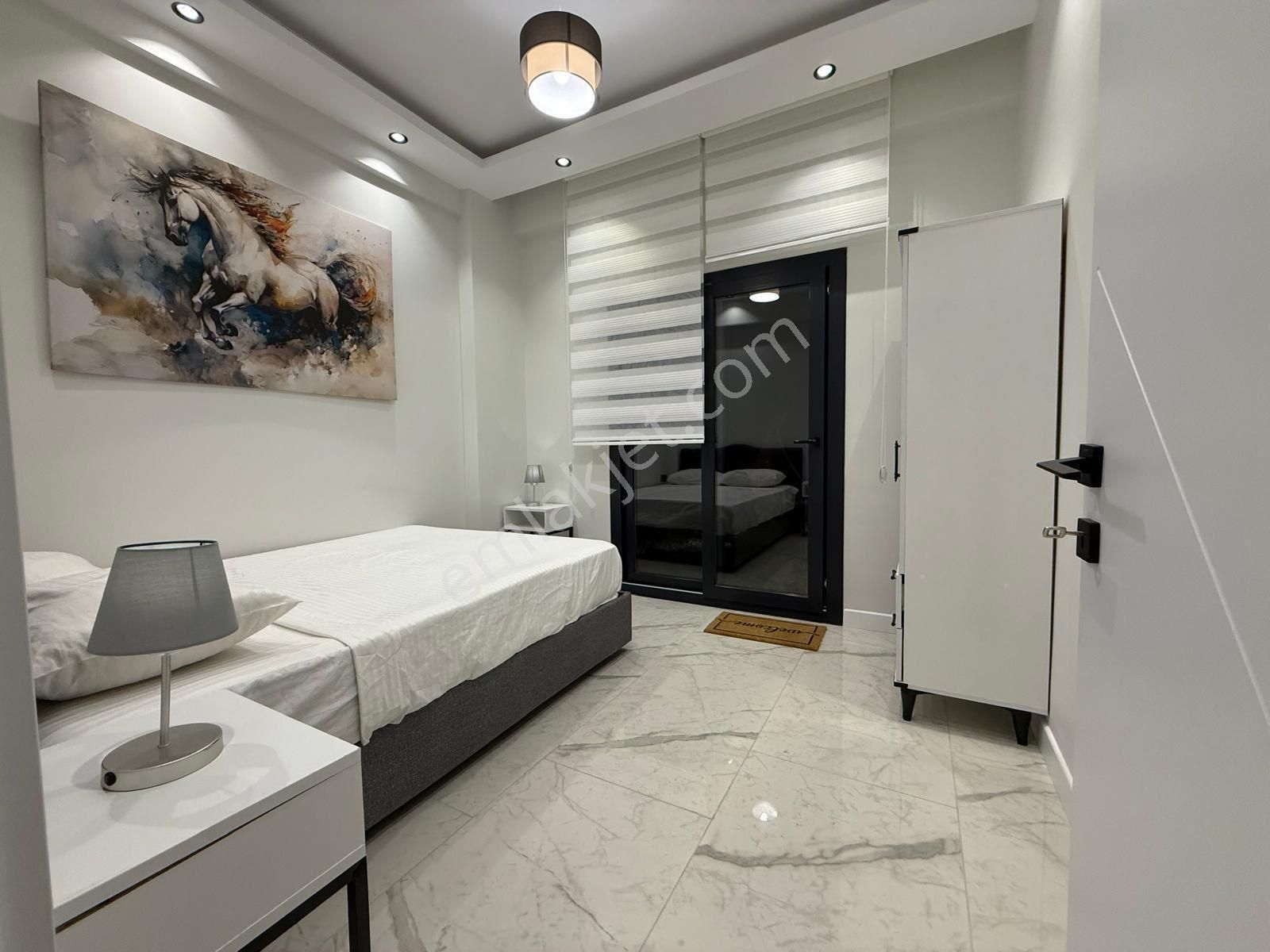 Kuşadası Değirmendere'de 2+1 Havuzlu Sitede Satılık Lüks Daire - Görsel 12