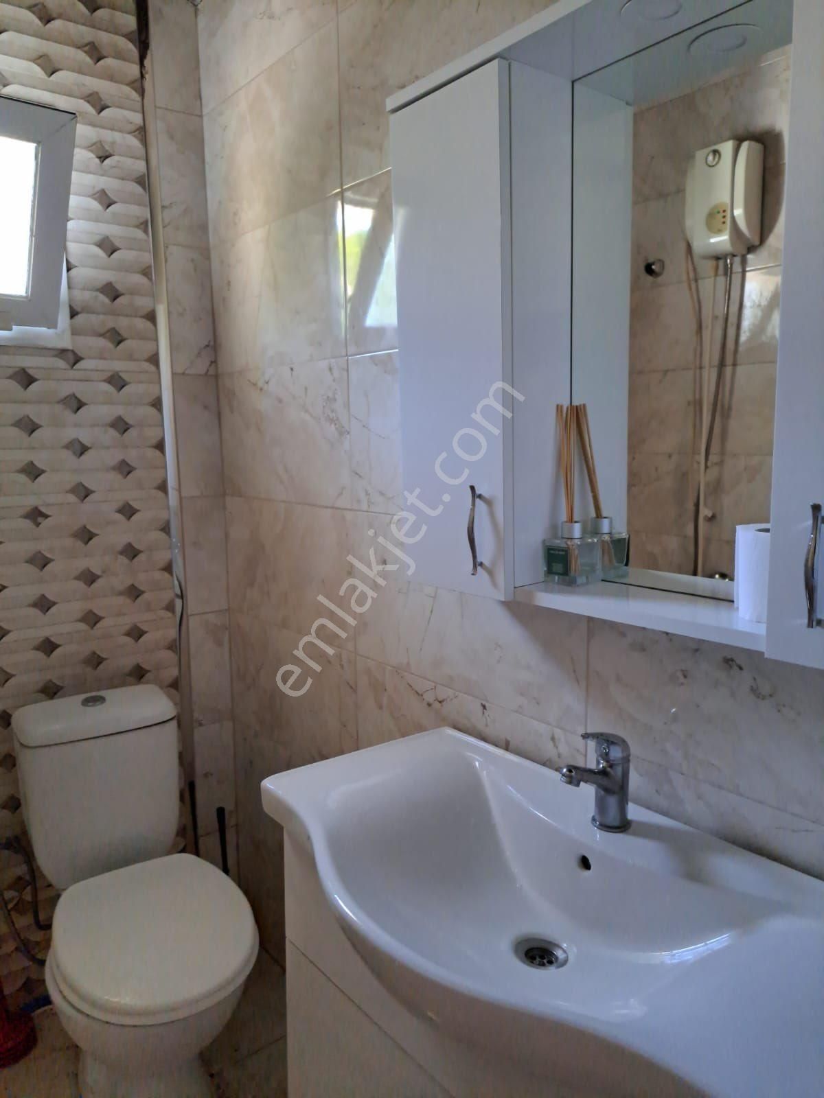 Seferihisar Doğanbey Site İçerisinde Deniz Tarafında Satılık 3 + 1 Tek Müstakil Geniş Bahçeli Villa - Görsel 23