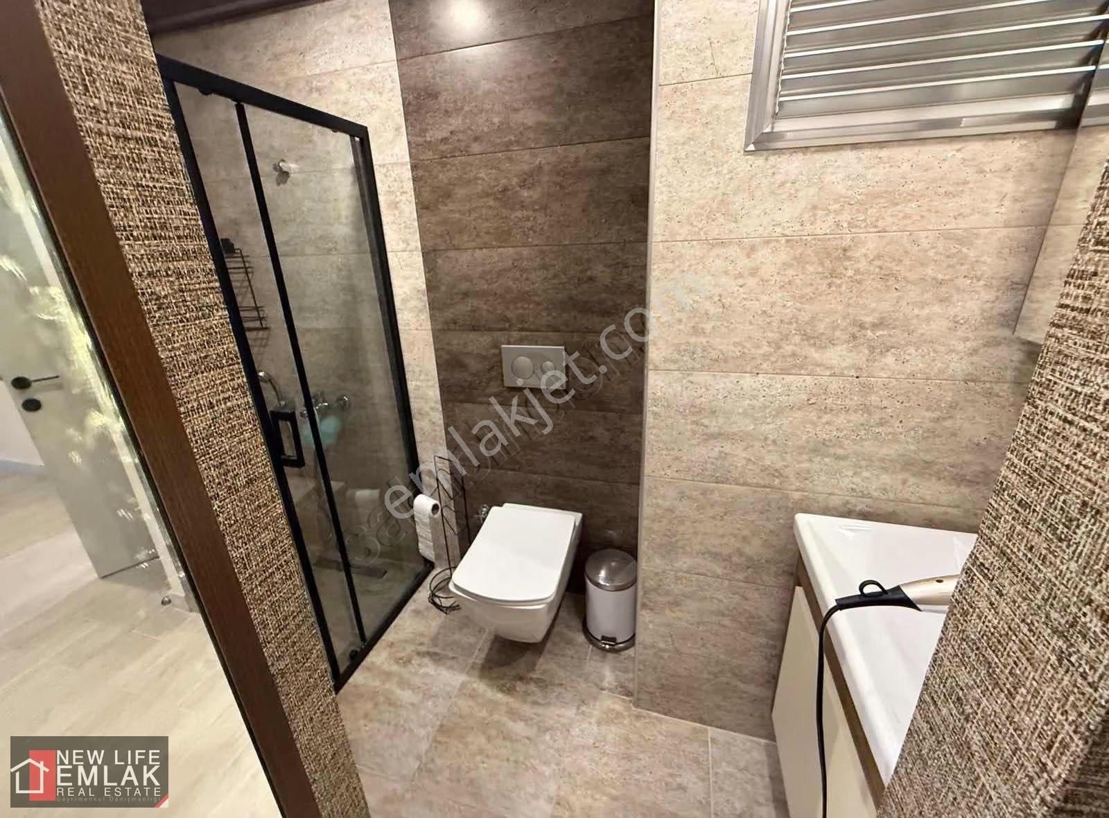 Kuşadası'nda Merkezi Konumda Bahçe Katında Satılık Daire - Görsel 2