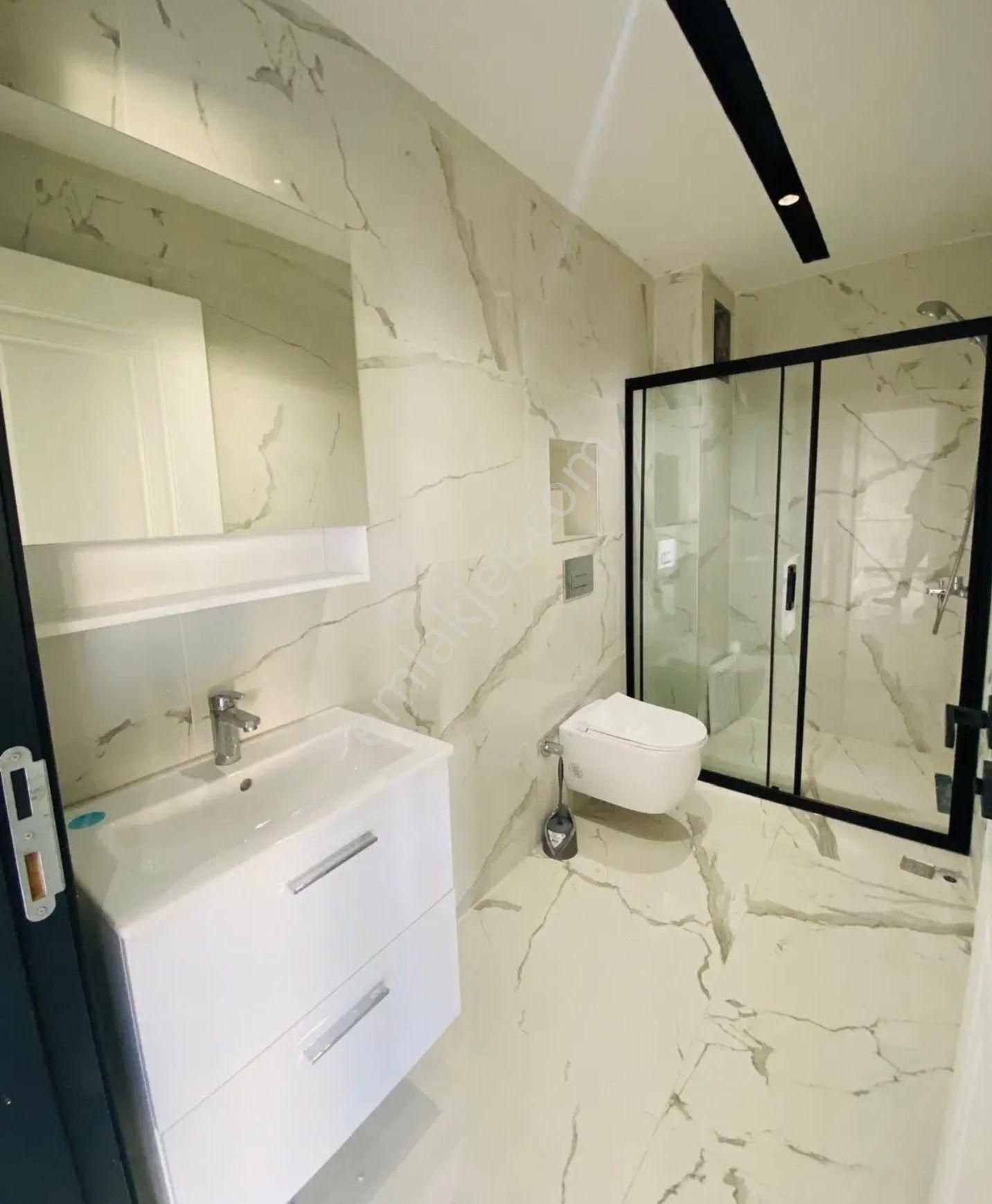 Kuşadası İkicesmelik Mahallesinde 1+1 2+1 Sıfır Havuzlu Otoparklı Güvenlikli Sitede - Görsel 25