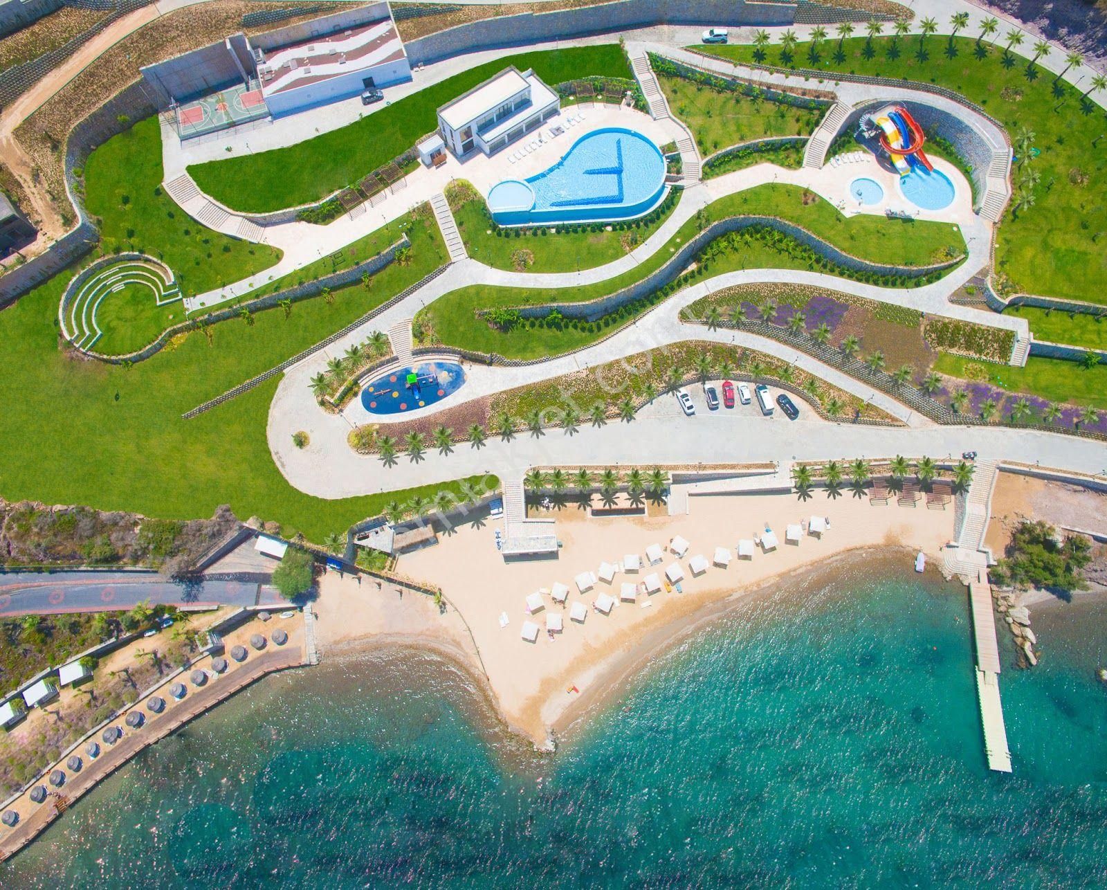 Muğla Boğaziçi Denize Sıfır Sitede Satılık Dubleks Bahçe Katı