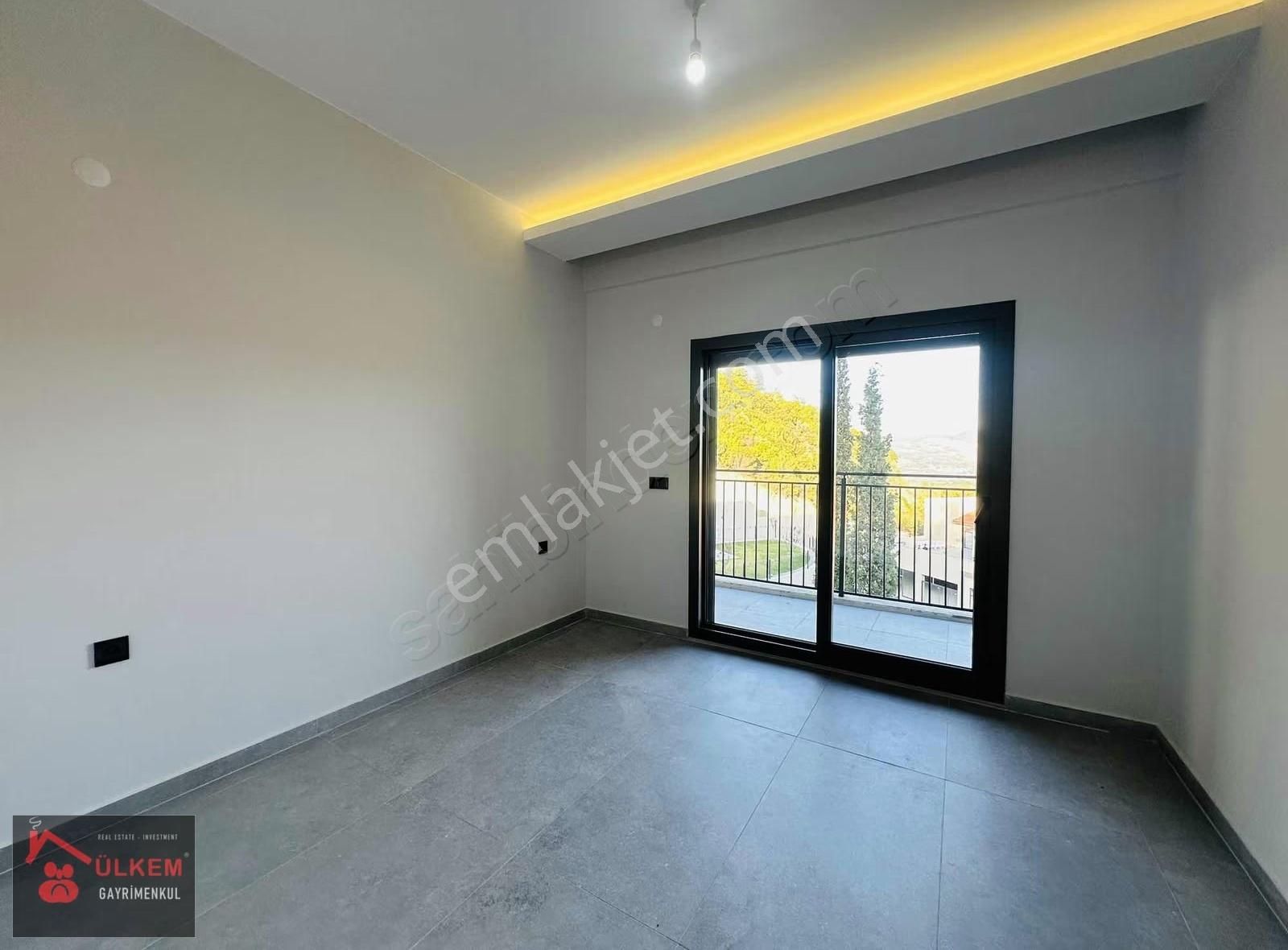 Kuşadası Davutlar Ağaçlıda Konsept 2+1 Tek Kat Bahceli Daire - Görsel 24