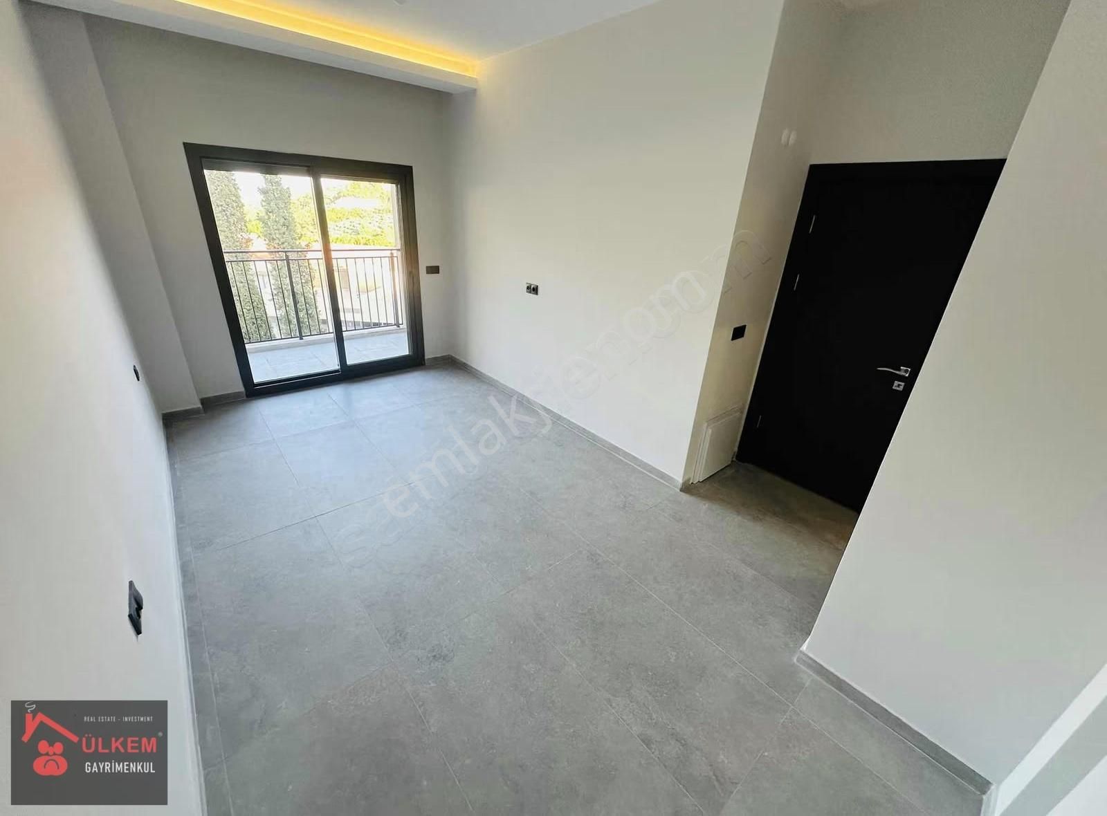 Kuşadası Davutlar Ağaçlıda Konsept 2+1 Tek Kat Bahceli Daire - Görsel 9