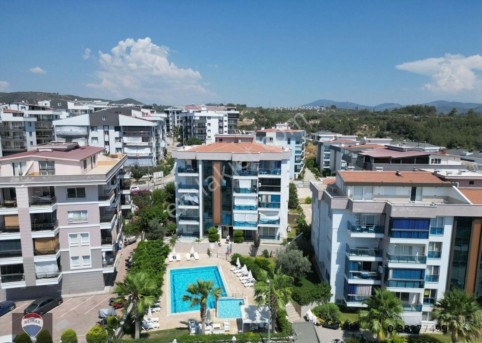 Kuşadası Havuzlu Yeni Siteiçinde Deniz Manzaralı Kaloriferli