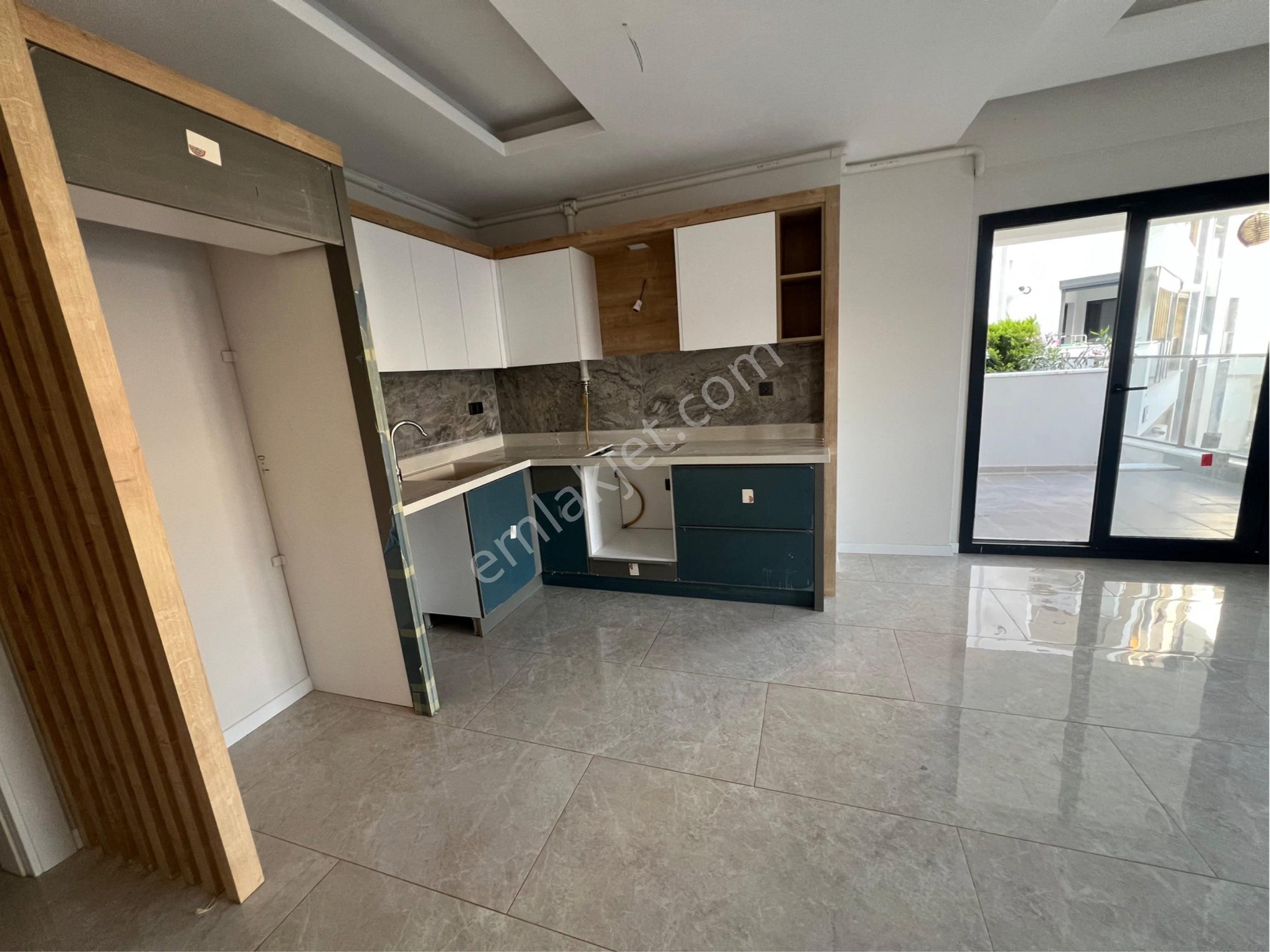 Kuşadası'nın Gelişen Bölgesinde 2+1 Sıfır Satılık Bahçe Katı Daire - Görsel 4