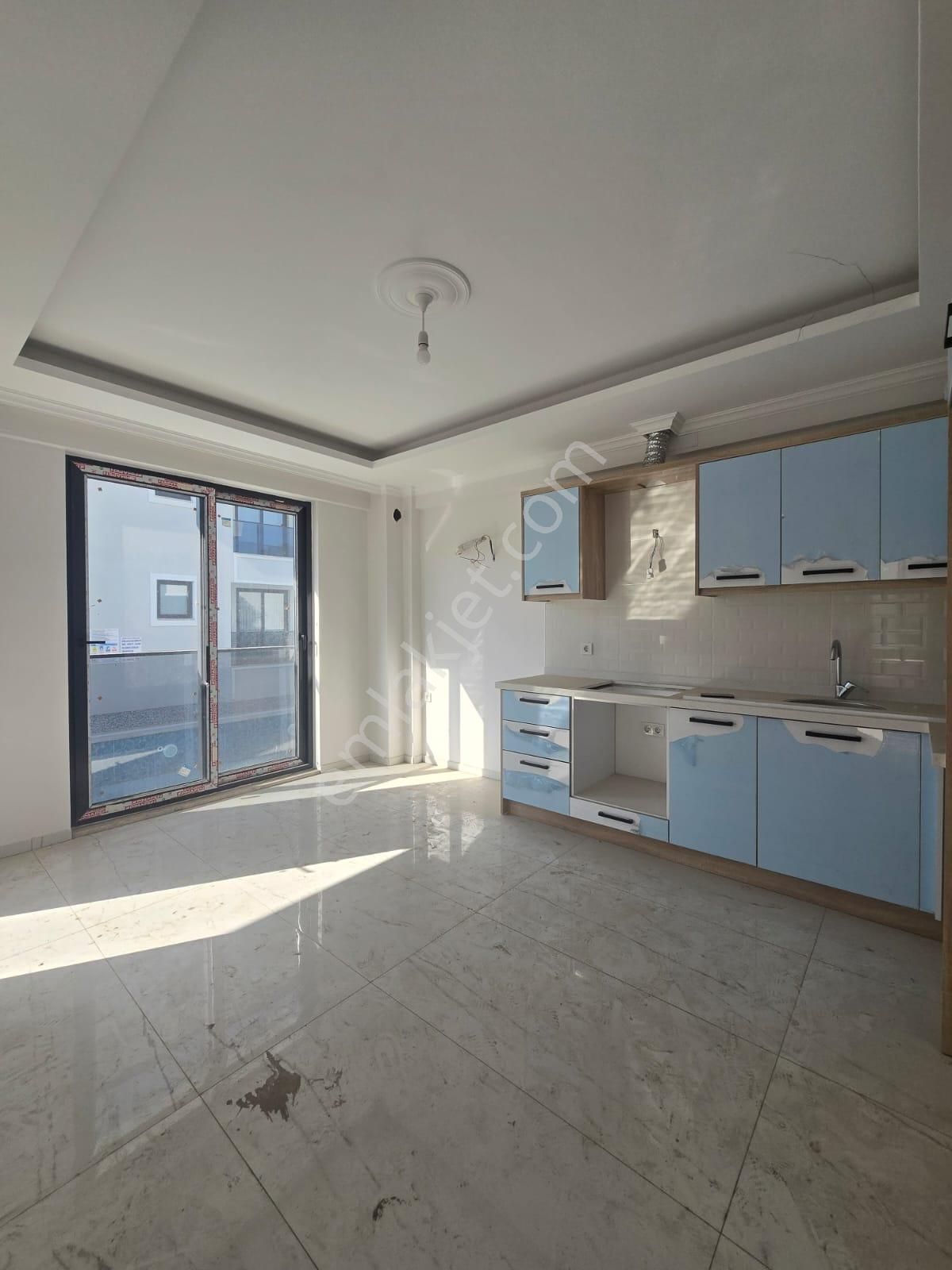 Çiğdem Emelak'tan Ortaca'da Havuzlu Satılık 1+1 Daire - Görsel 15