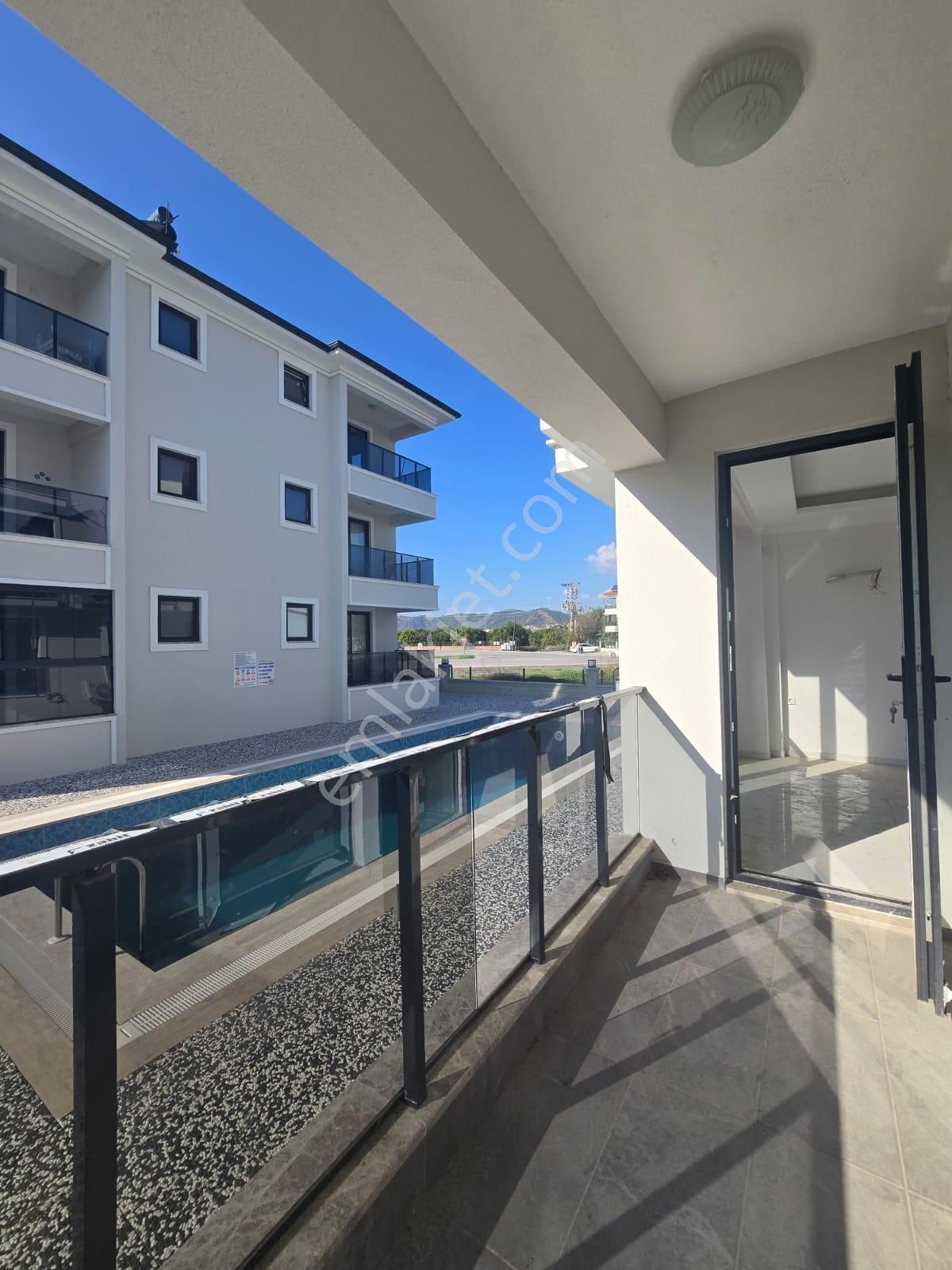 Çiğdem Emelak'tan Ortaca'da Havuzlu Satılık 1+1 Daire - Görsel 8