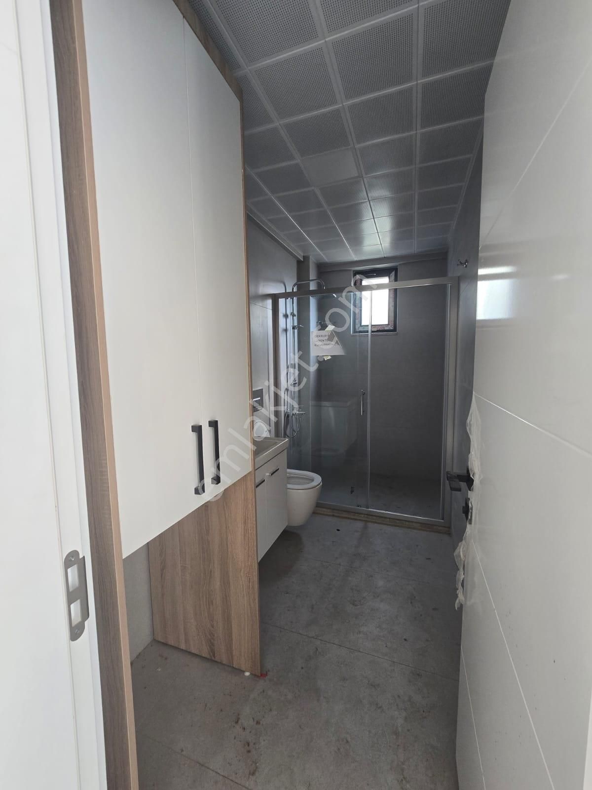 Çiğdem Emelak'tan Ortaca'da Havuzlu Satılık 1+1 Daire - Görsel 16