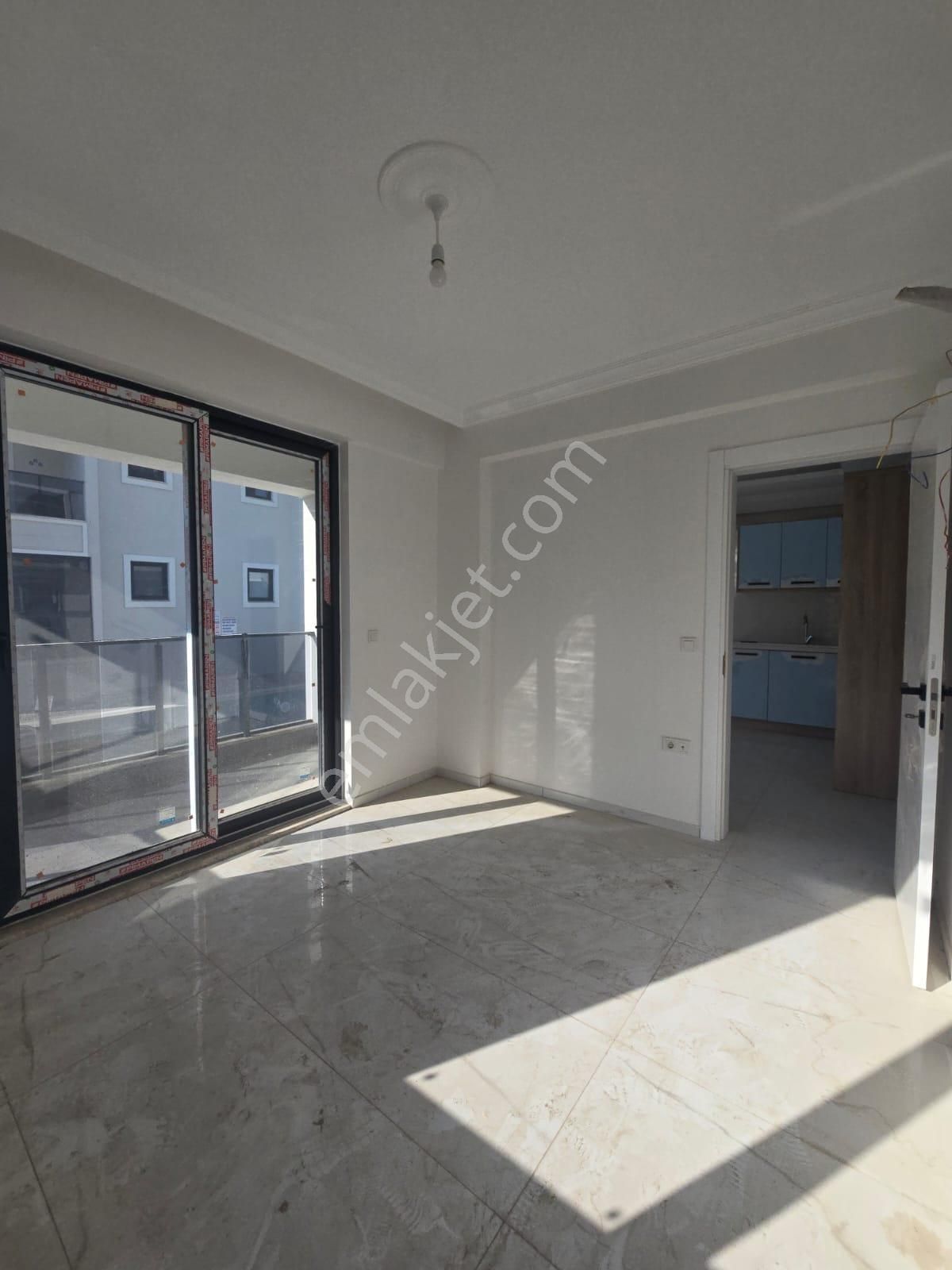 Çiğdem Emelak'tan Ortaca'da Havuzlu Satılık 1+1 Daire - Görsel 5