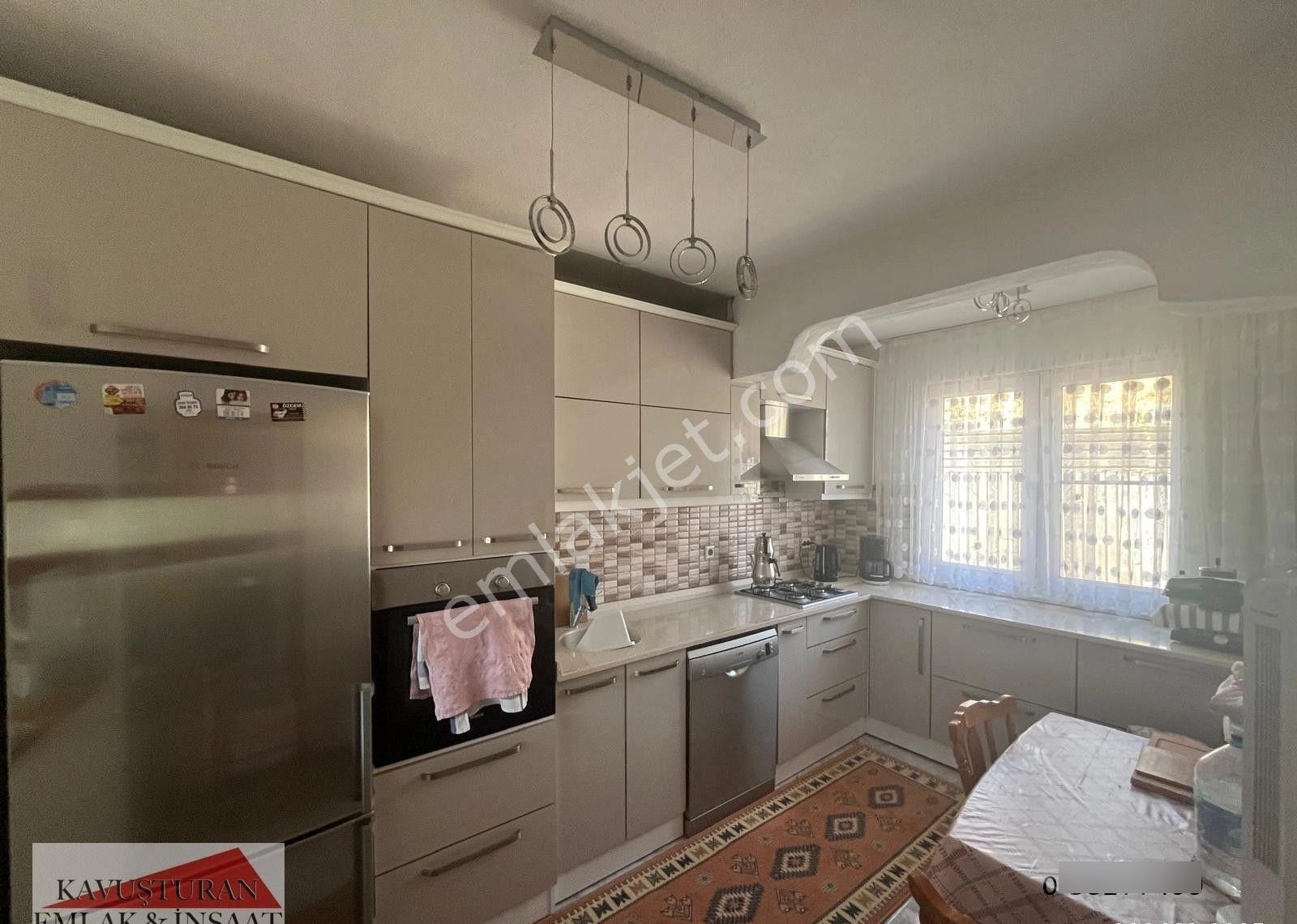 Kavuşturan Emlak'tan Akçay Güre'de Deniz Manzaralı Satılık Villa