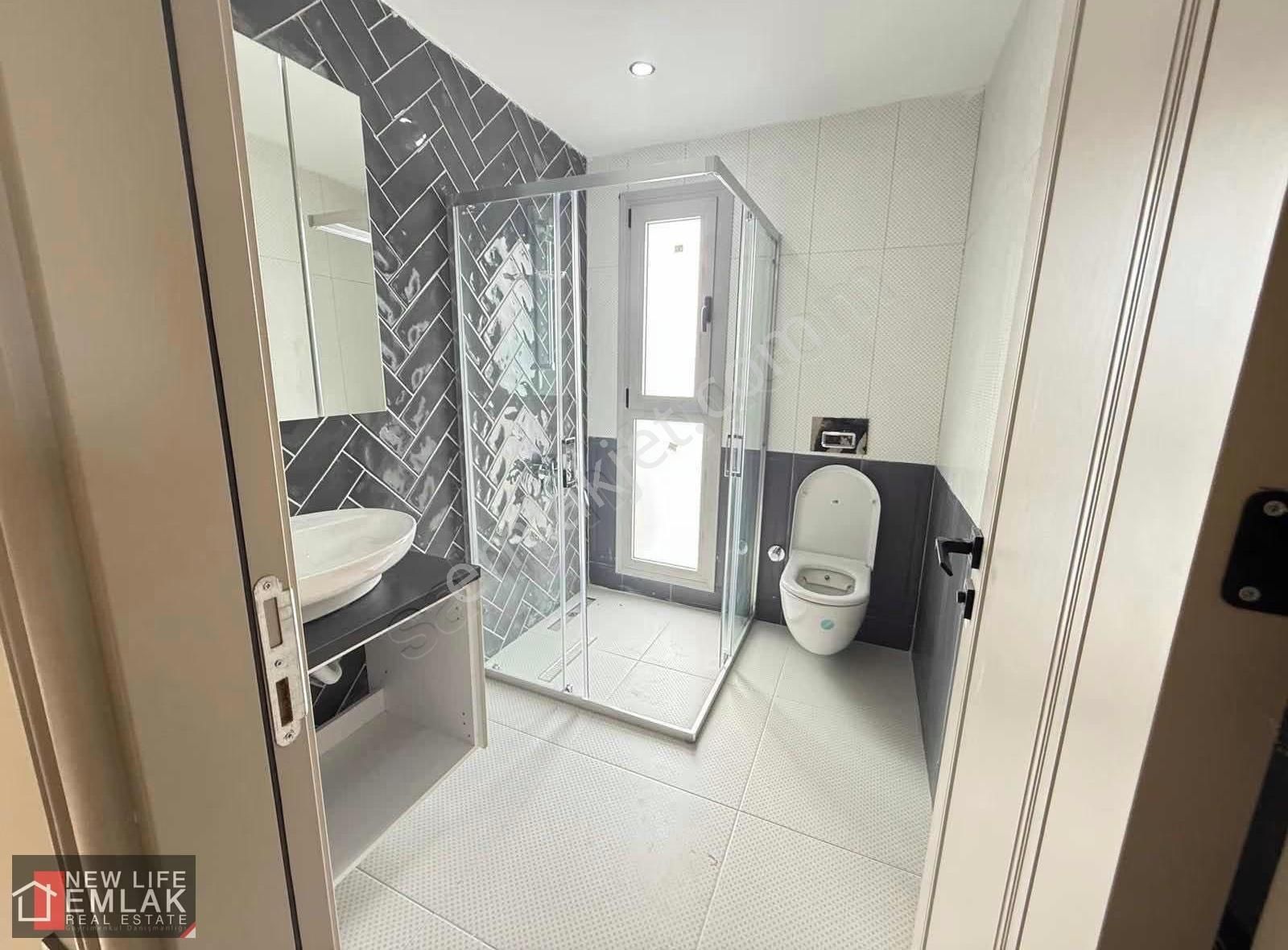 Kuşadası Merkezde Havuzlu Sitede Deniz Manzaralı Satılık Daire - Görsel 13