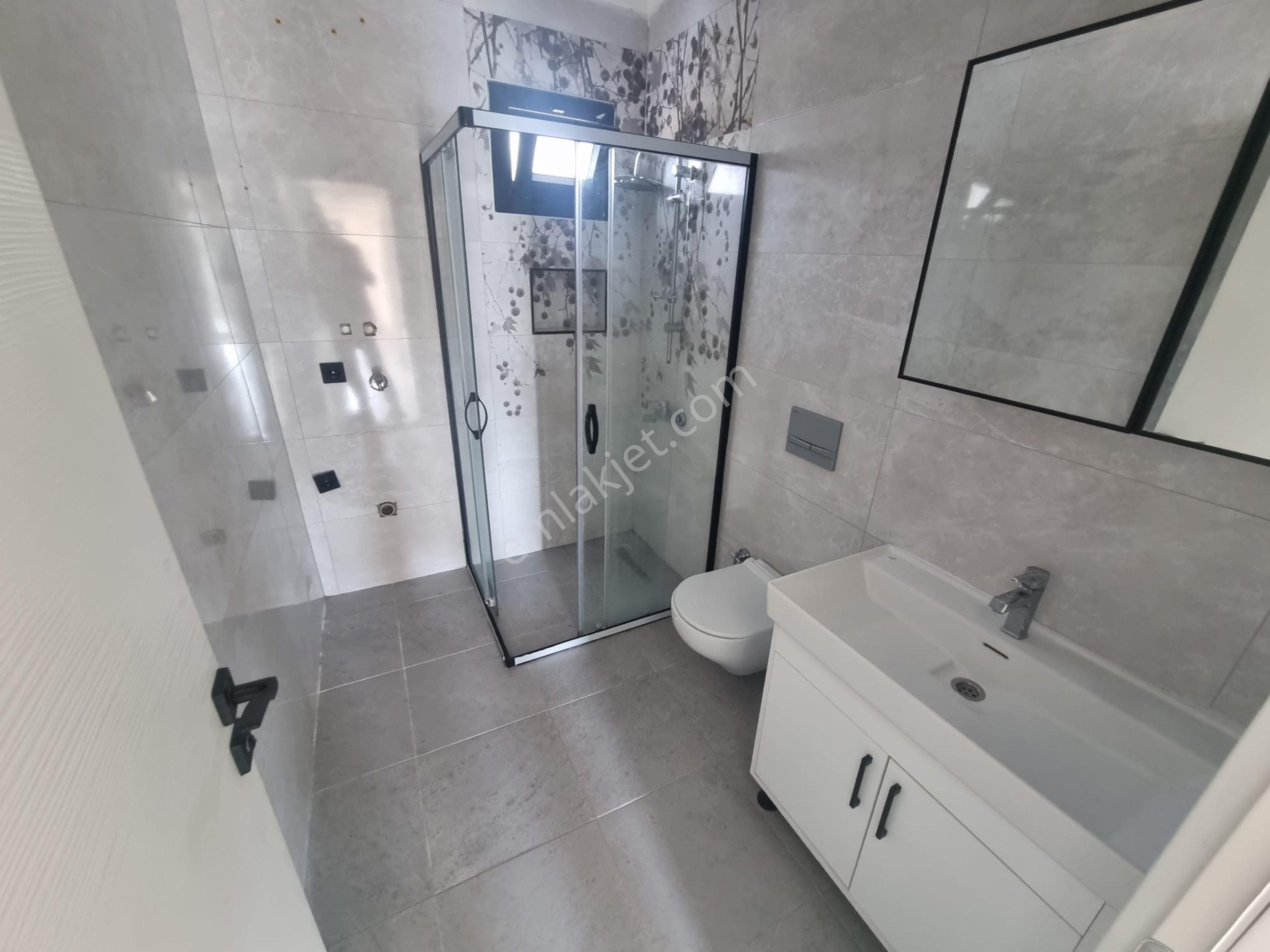 Zirve Gayrimenkul'den Havuzlu Sitede Bahçe Katı 2+1 Daire - Görsel 13