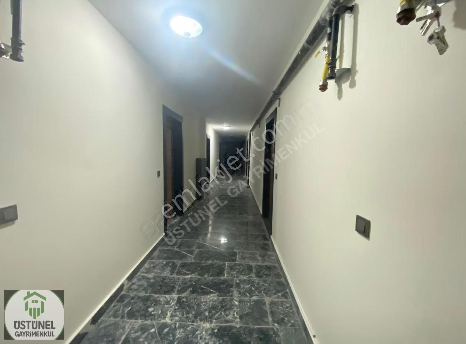 Üstünel'den Görüklede Sıfır Bina Sıfır Eşyalı 1+1 Satılık Daire - Görsel 22