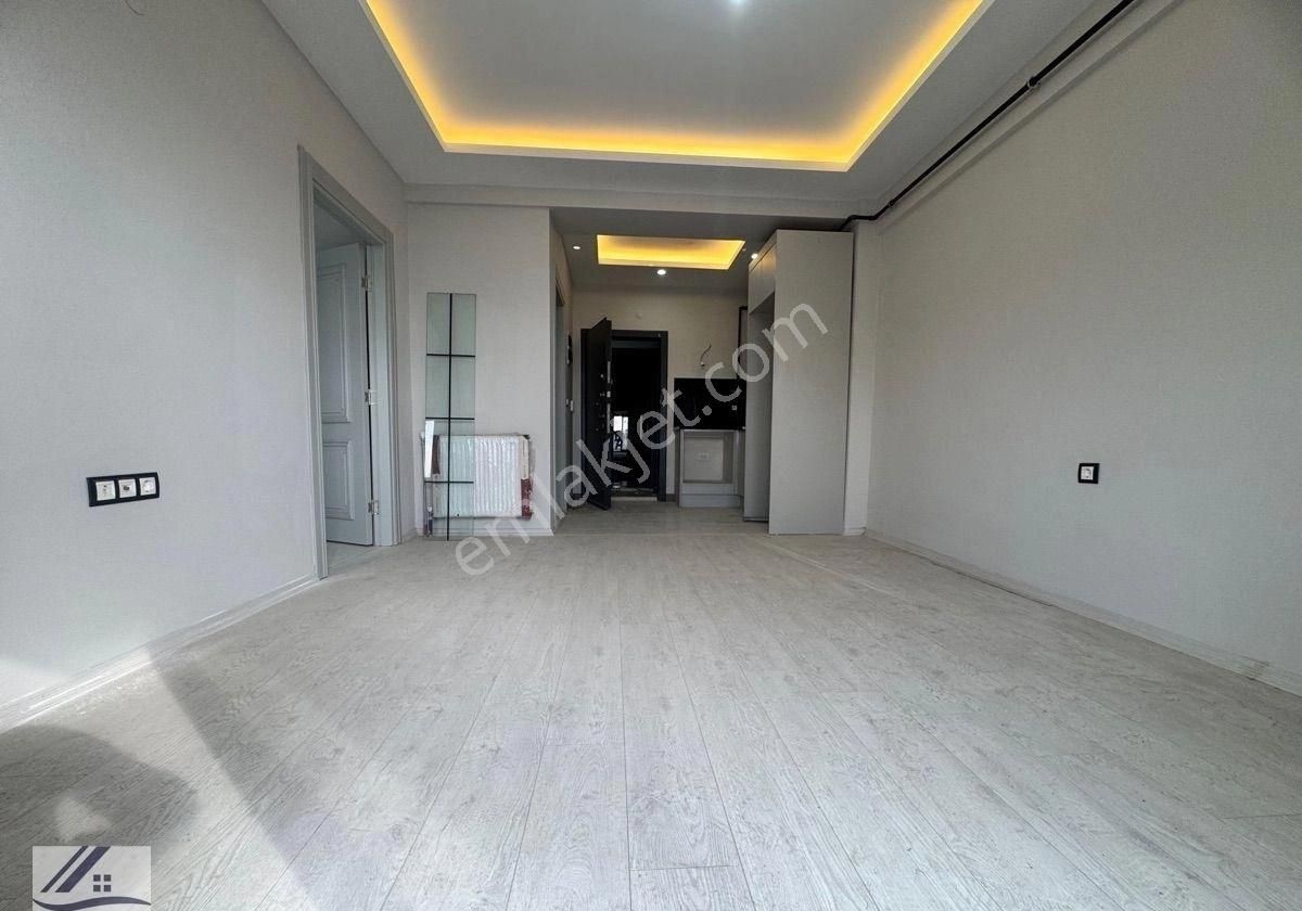 Bornova Kızılay Mahallesinde Site İçi 1+1 Lüks Arakat Asansörlü Otoparklı Satılık - Görsel 4