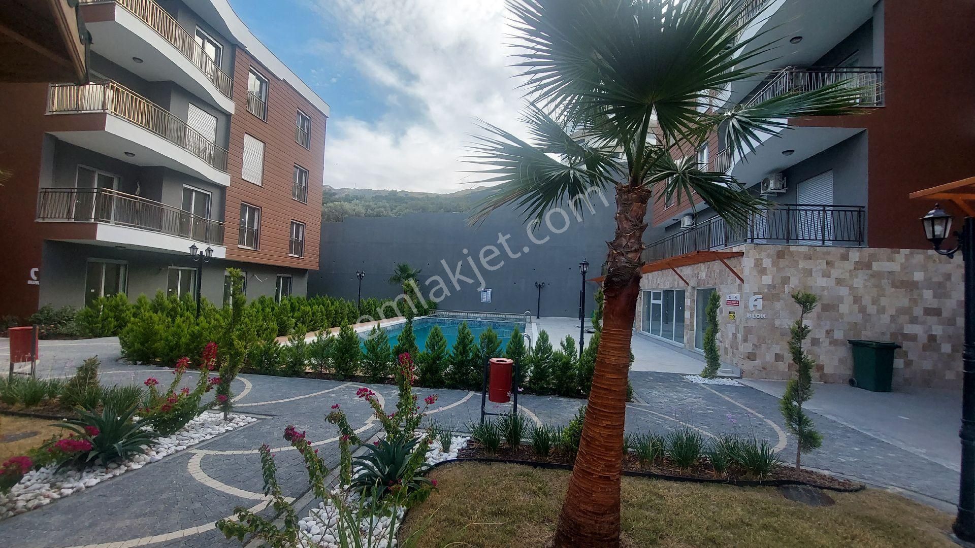 Kuşadası Değirmenderede Havuzlu Sitede Yerden Isıtmalı Sıfır Lüx 3+1 Daire - Görsel 2