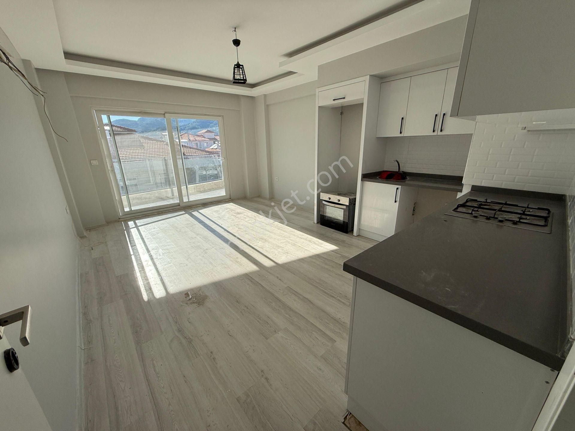 Muğla Ortaca Merkezde Yüzme Havuzlu Sıfır 3 Katlı Binanın Orta Katında Bulunan 2+1 Daire Satılık - Görsel 14