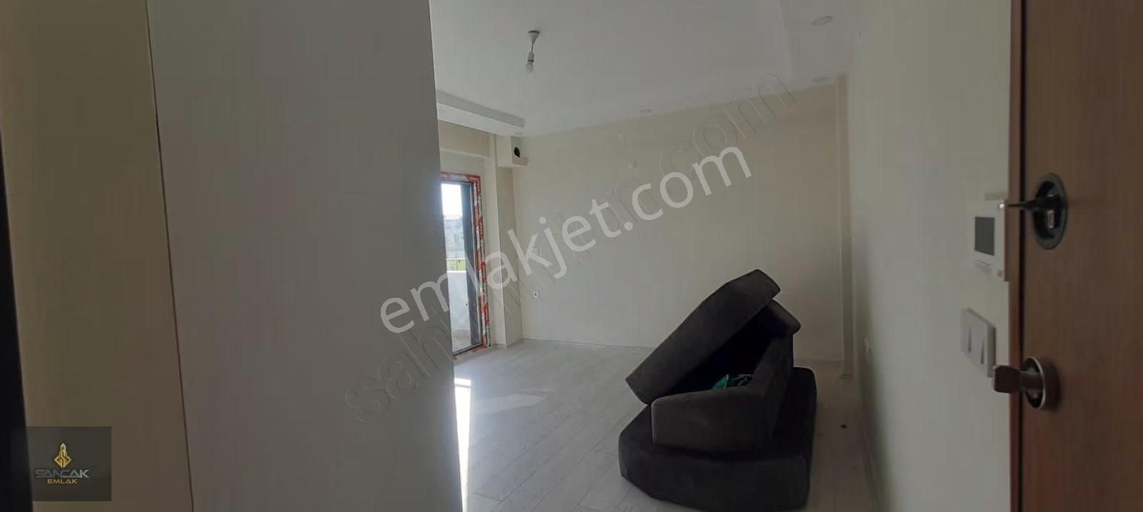 Sancak Emlaktan Sahilde 1+1 Sıfır Daire...