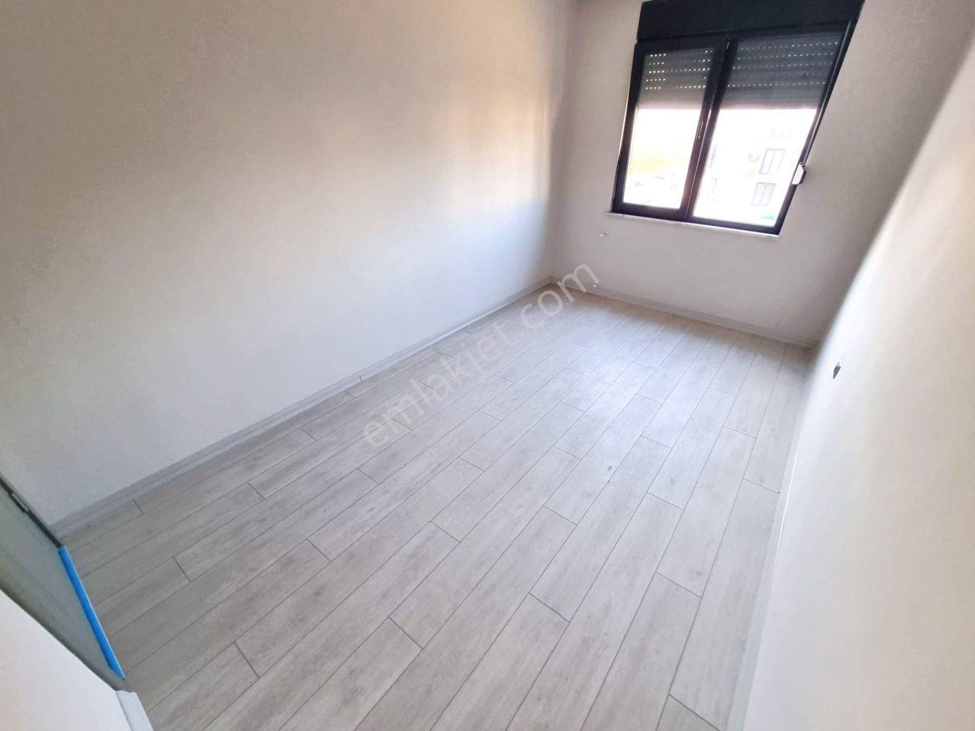 Akçay'da Aygülden Sıfır Denize Çok Yakın Ayrı Mutfak Ebeveyn Banyolu Doğalgazlı 2+1 Satılık Daireler - Görsel 24