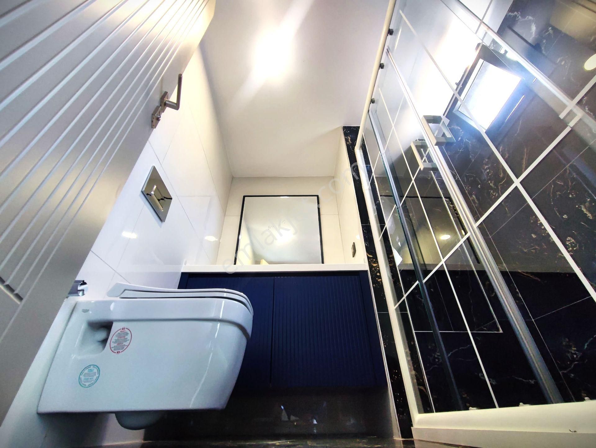 Aygülden Edremit Zeytinli'de Sıfır Özel Tasarımı İle Dikkatleri Üzerine Çeken Lüks 4+1 Satılık Villa - Görsel 35