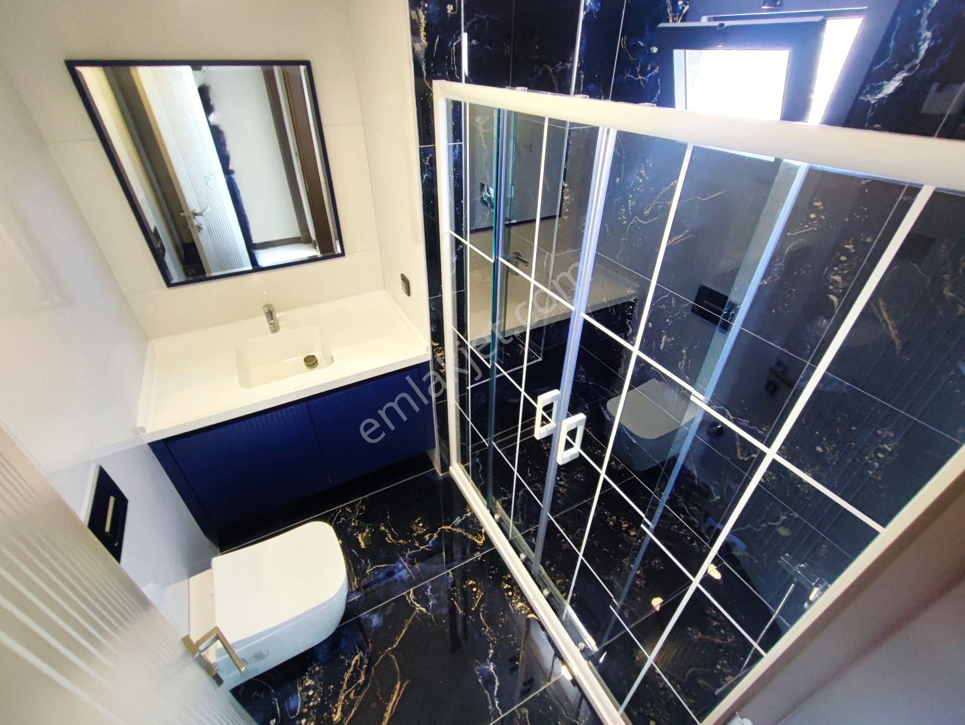 Aygülden Edremit Zeytinli'de Sıfır Özel Tasarımı İle Dikkatleri Üzerine Çeken Lüks 4+1 Satılık Villa - Görsel 34