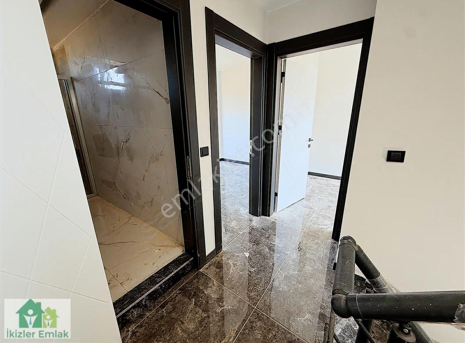 Ürkmez Doğanbey'de Denize Yakın Satılık Sıfır Bahceli 2+1 Villa - Görsel 11