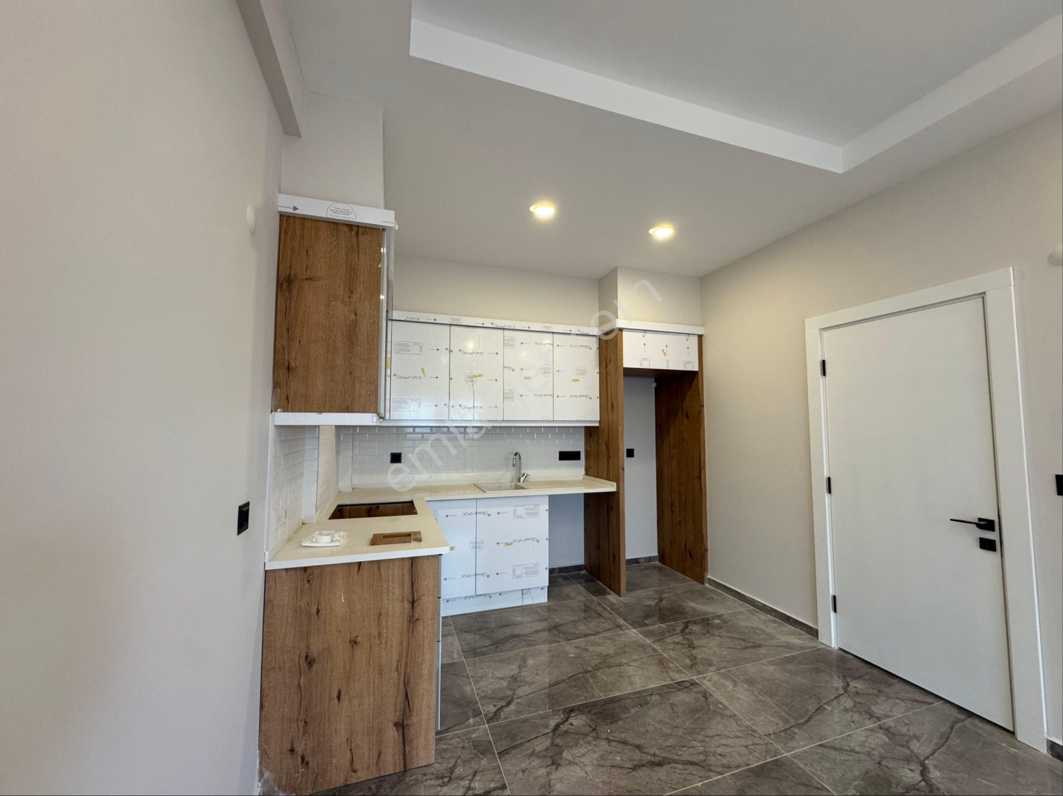 Kuşadası Güzelçamlı Mahallesinde Satılık Sıfır 1+1 Daire - Görsel 28