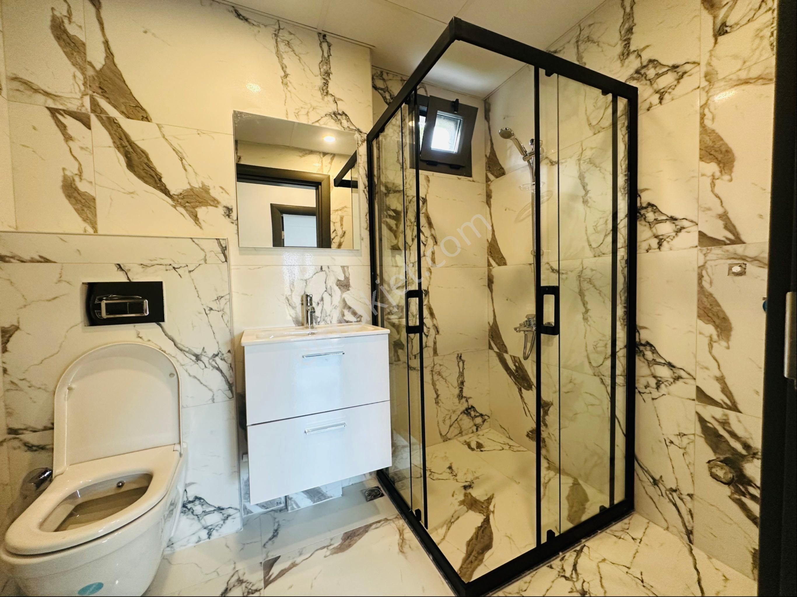 Kuşadası Davutlar Ağaçlıda Konsept 2+1 Tek Kat Bahceli Daire - Görsel 32